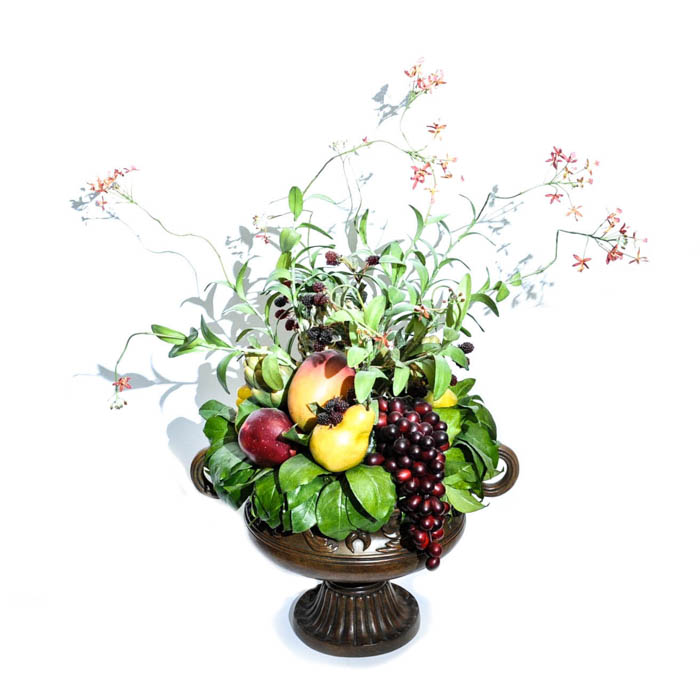 Footed Urn With Decorative Silk Flower And Fruit Arrangement