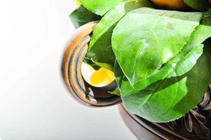 Footed Urn With Decorative Silk Flower And Fruit Arrangement