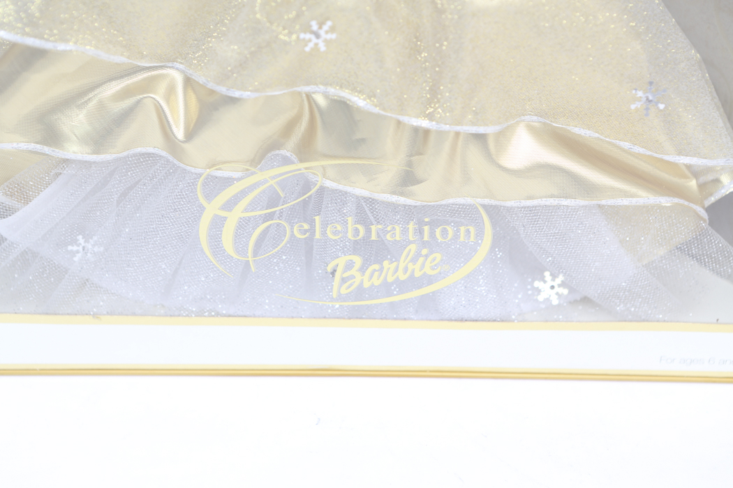 "Happy Holidays Barbie" and "Celebration Barb"e: