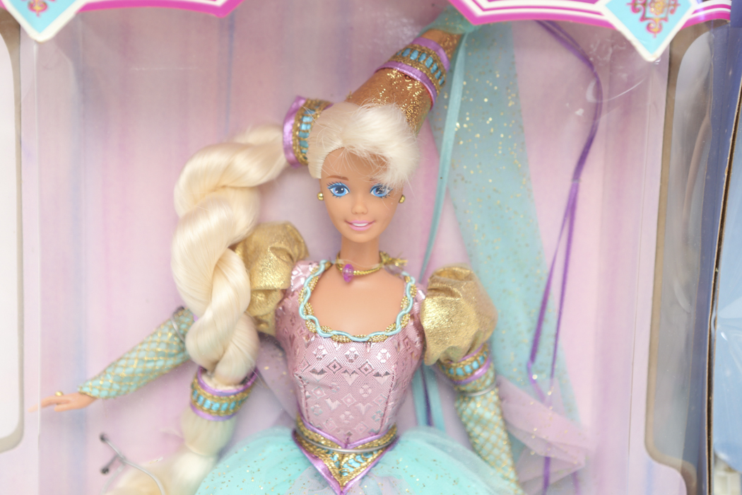 "Rapunzel" Barbie and "Swan Lake" Barbie
