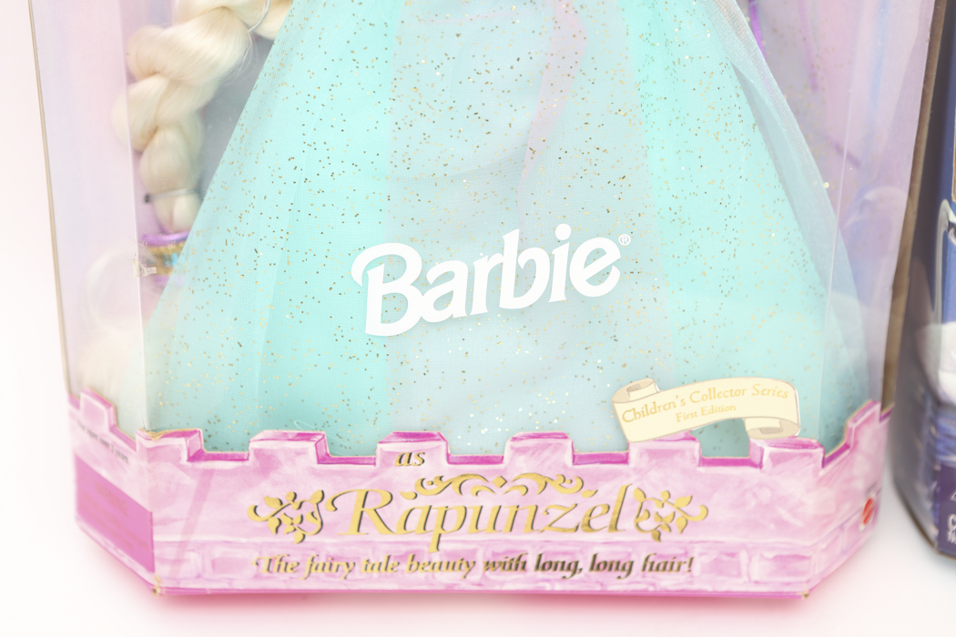 "Rapunzel" Barbie and "Swan Lake" Barbie