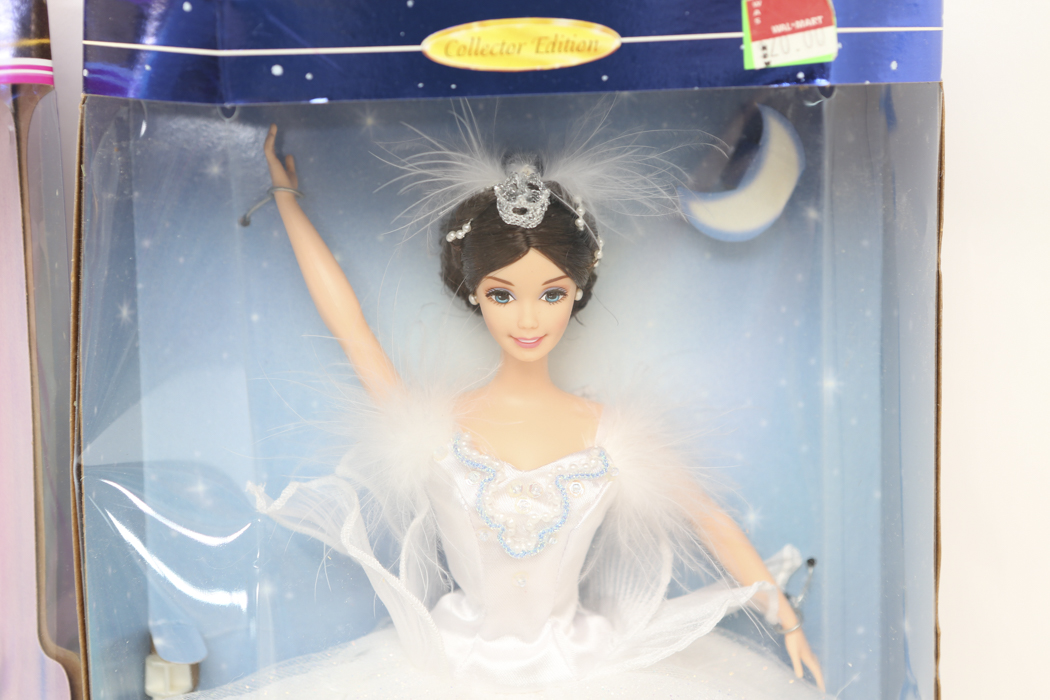 "Rapunzel" Barbie and "Swan Lake" Barbie