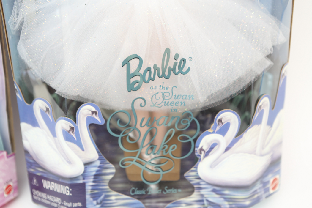 "Rapunzel" Barbie and "Swan Lake" Barbie
