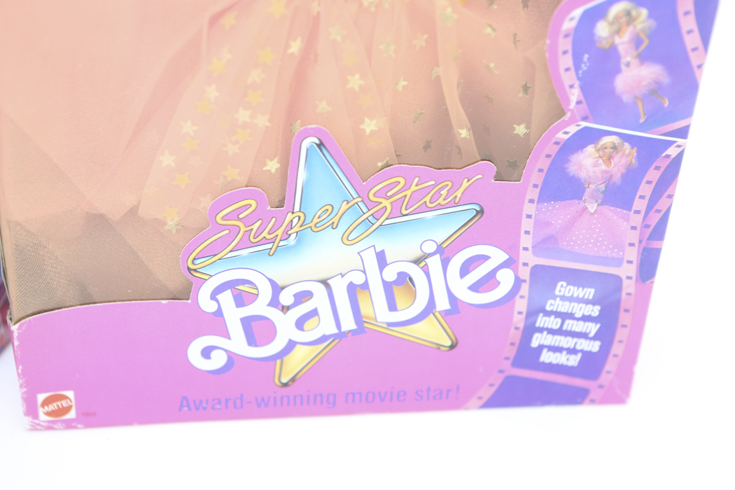 "Super Star" Barbie and "Unicef" Barbie