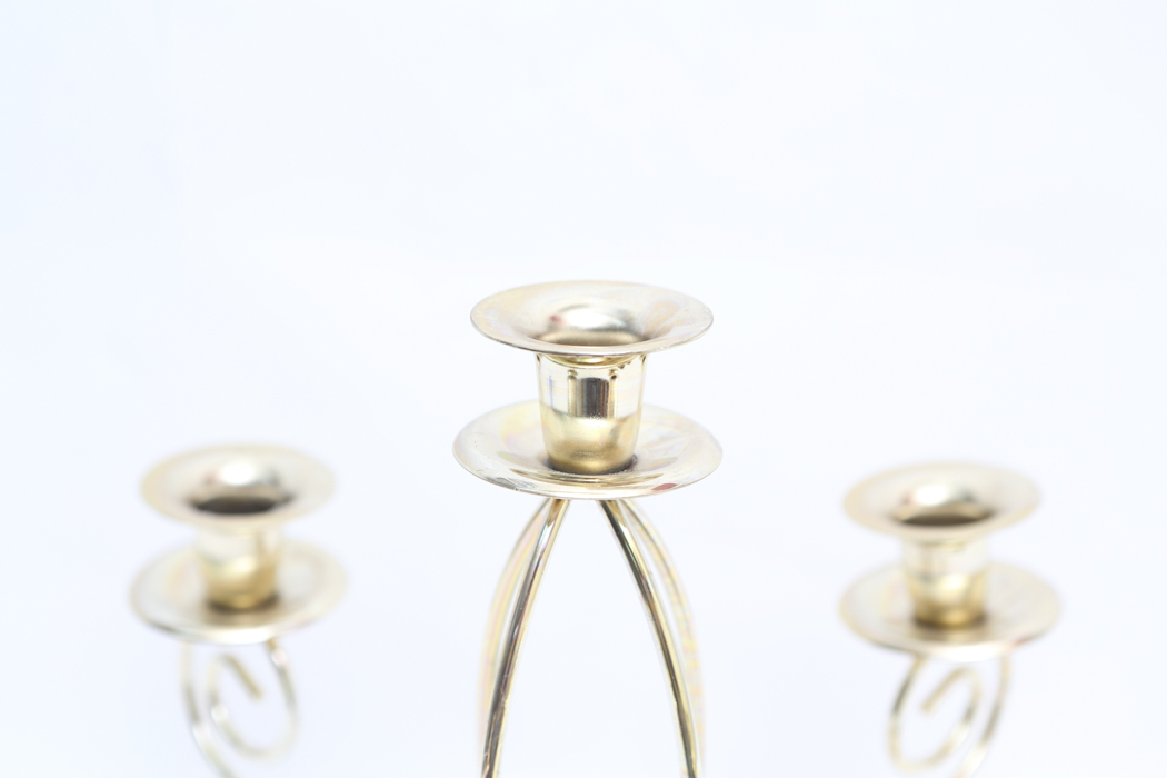 Brass Candelabra and Four Small Brass Candlesticks