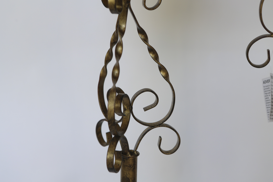 Two Metal Scrolled Candle Holders with Pillar Candles