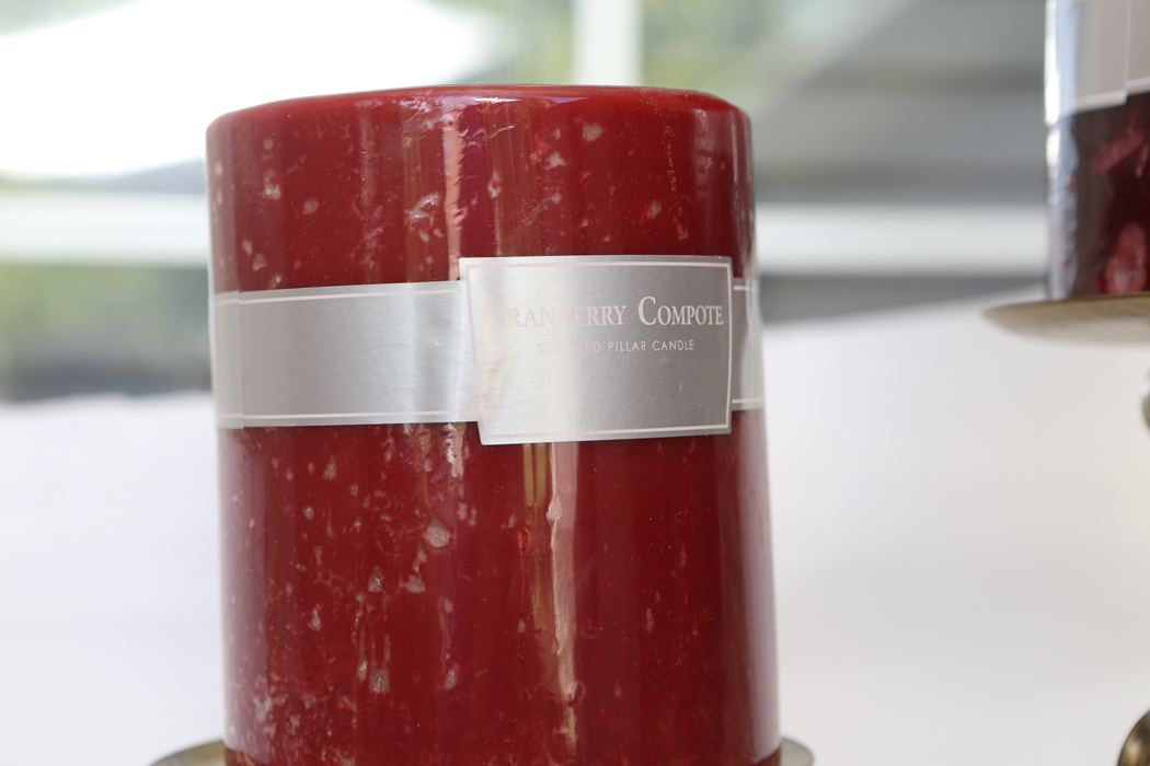 Two Metal Scrolled Candle Holders with Pillar Candles