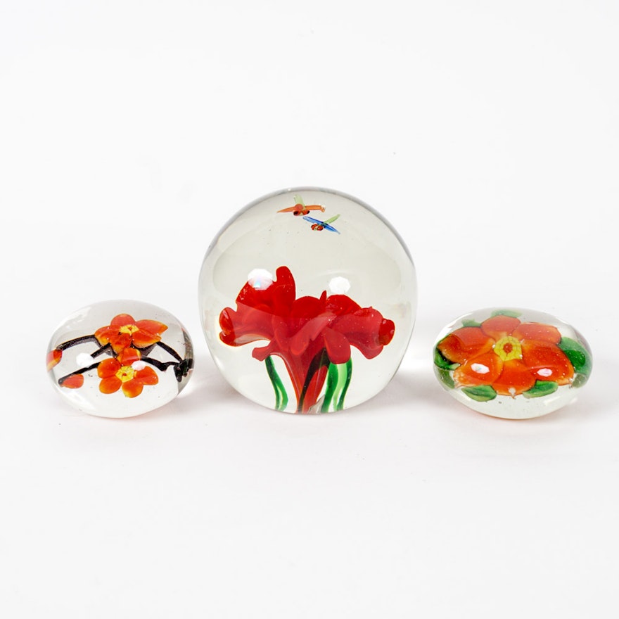 Set of Three Glass Paperweights with Flowers