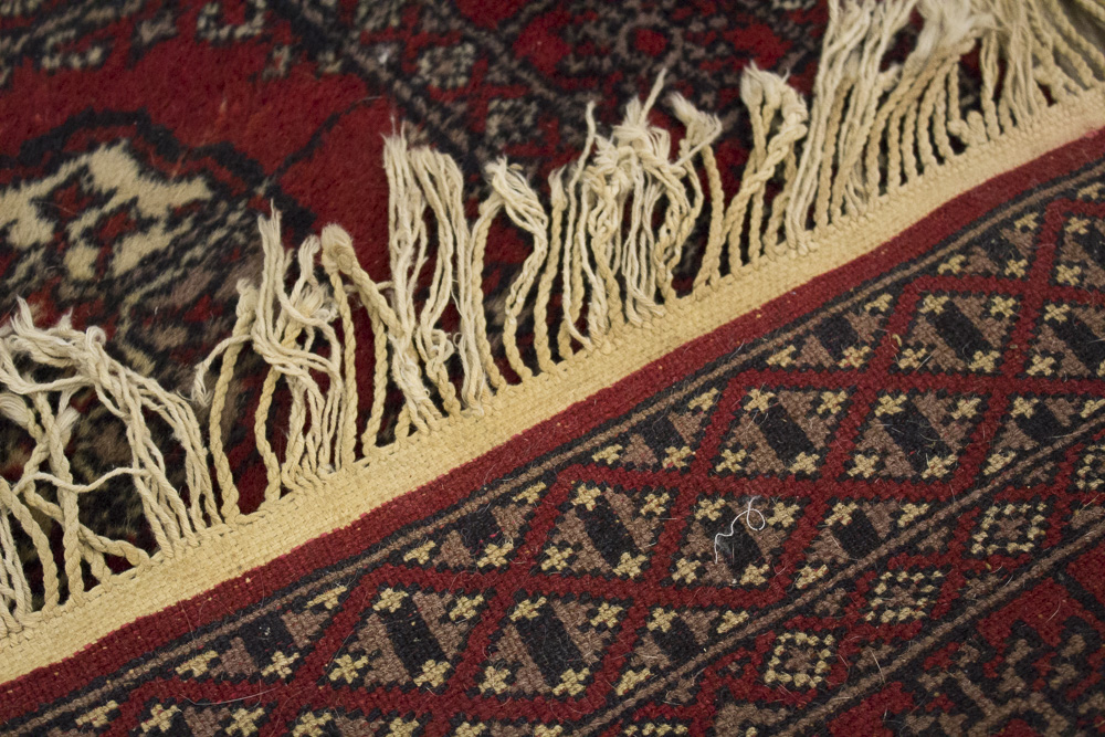 Hand-Knotted Pakistani Bokhara Accent Rug