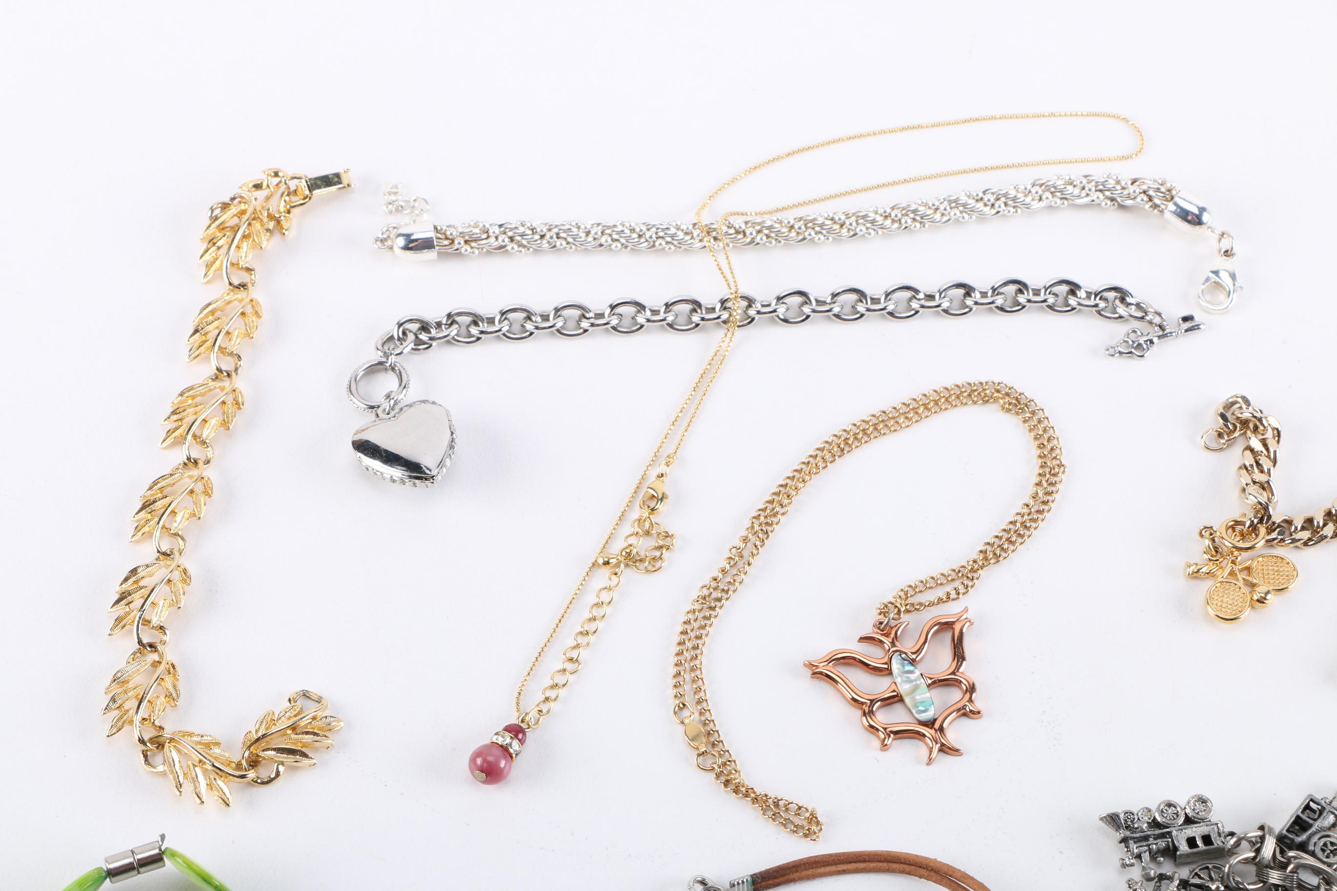 Costume Jewelry Assortment Including Charm Bracelets
