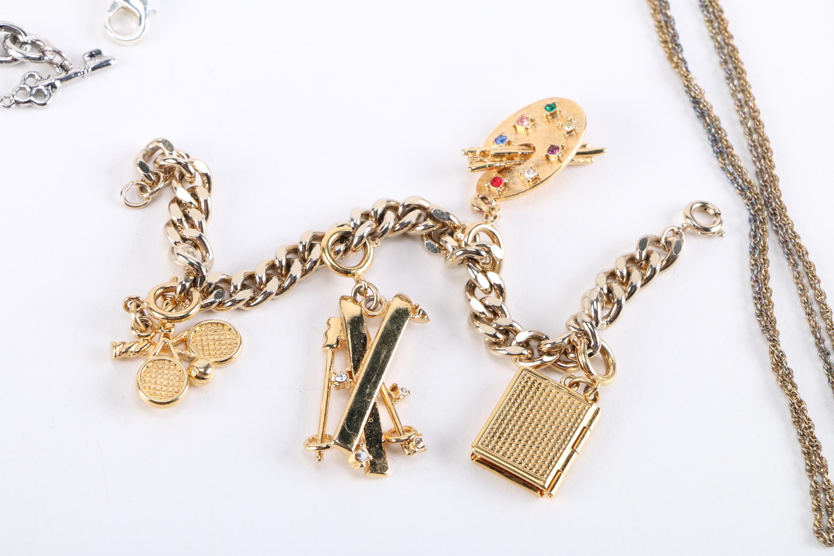 Costume Jewelry Assortment Including Charm Bracelets