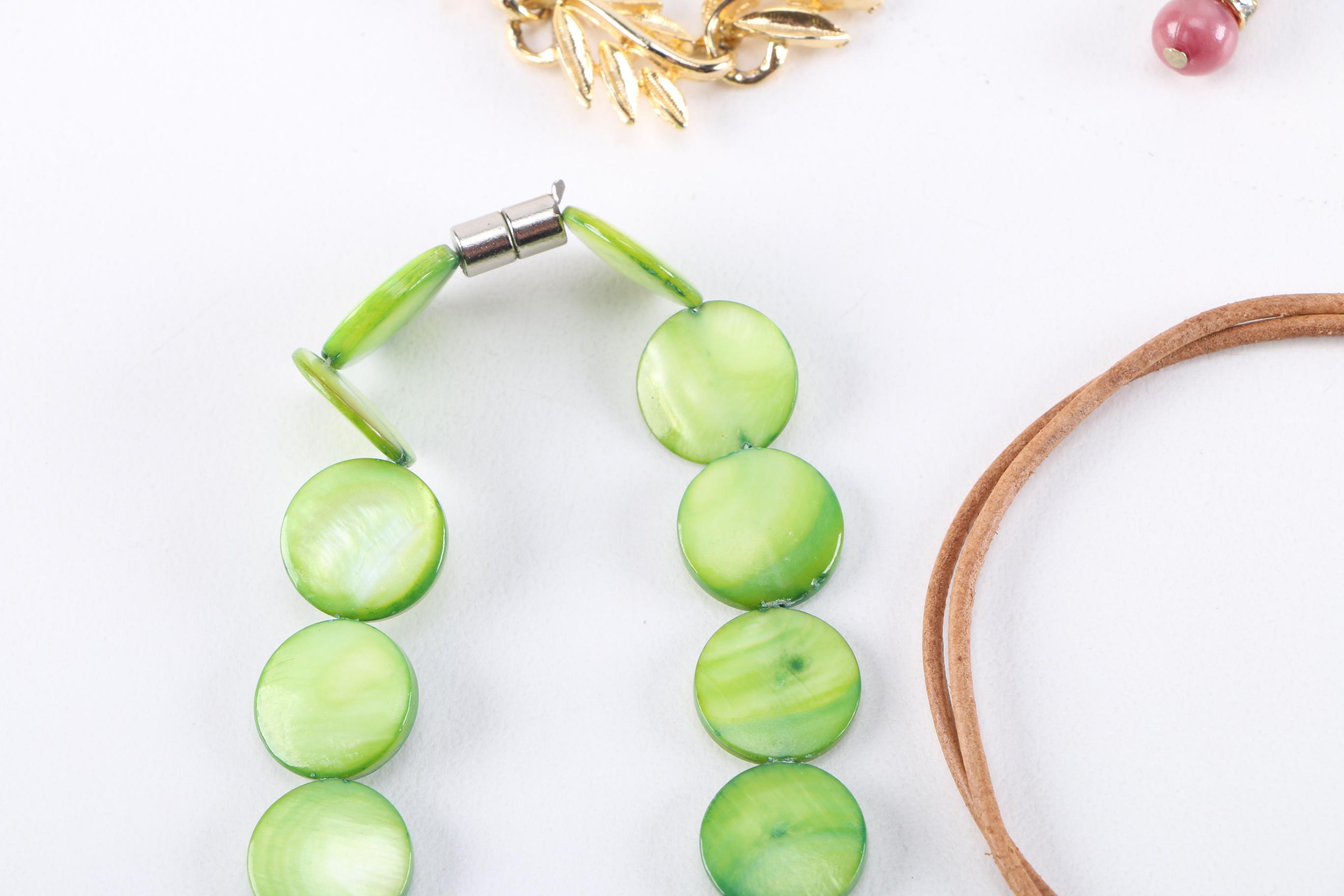 Costume Jewelry Assortment Including Charm Bracelets