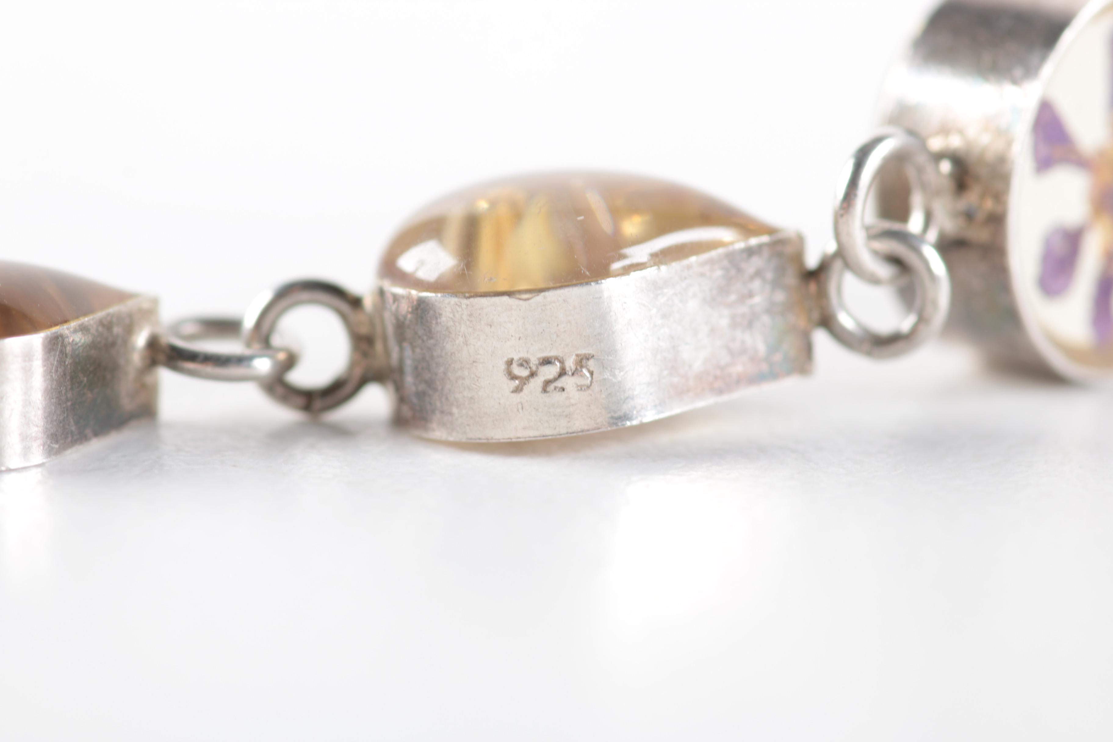 Sterling Silver Jewelry with Flowers Encased in Resin