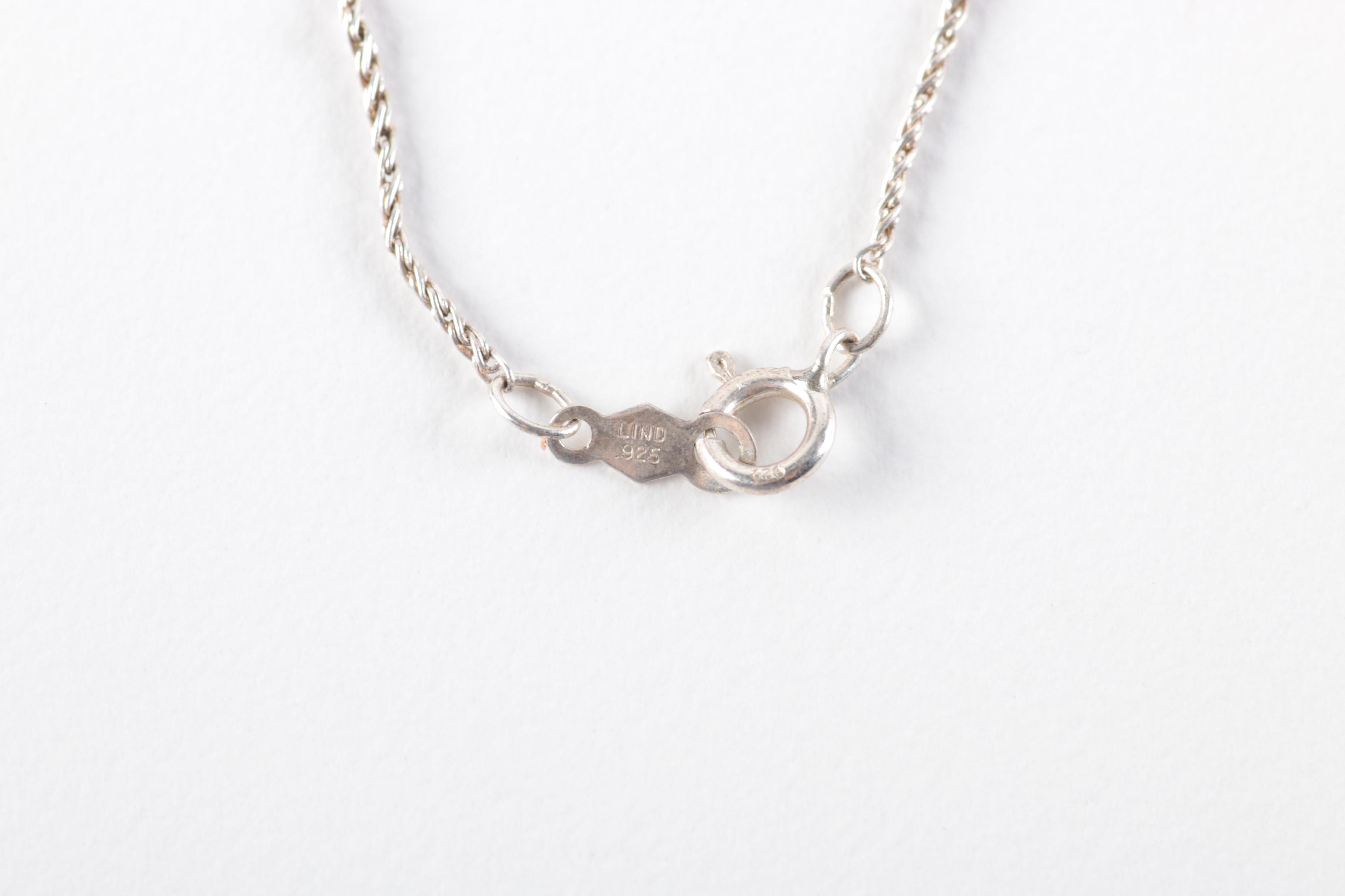 Sterling Silver Jewelry with Flowers Encased in Resin