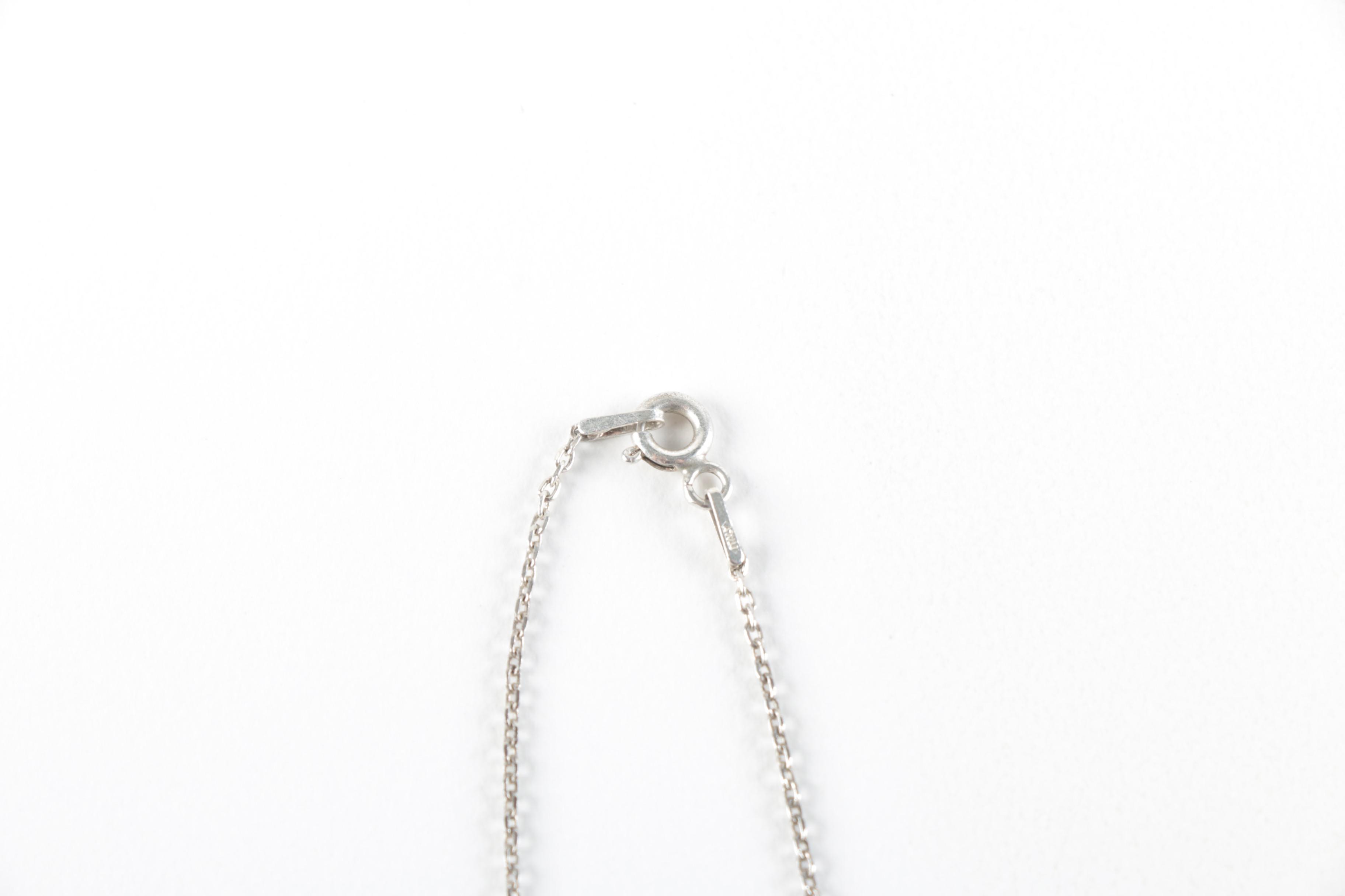 Sterling Silver Jewelry with Flowers Encased in Resin