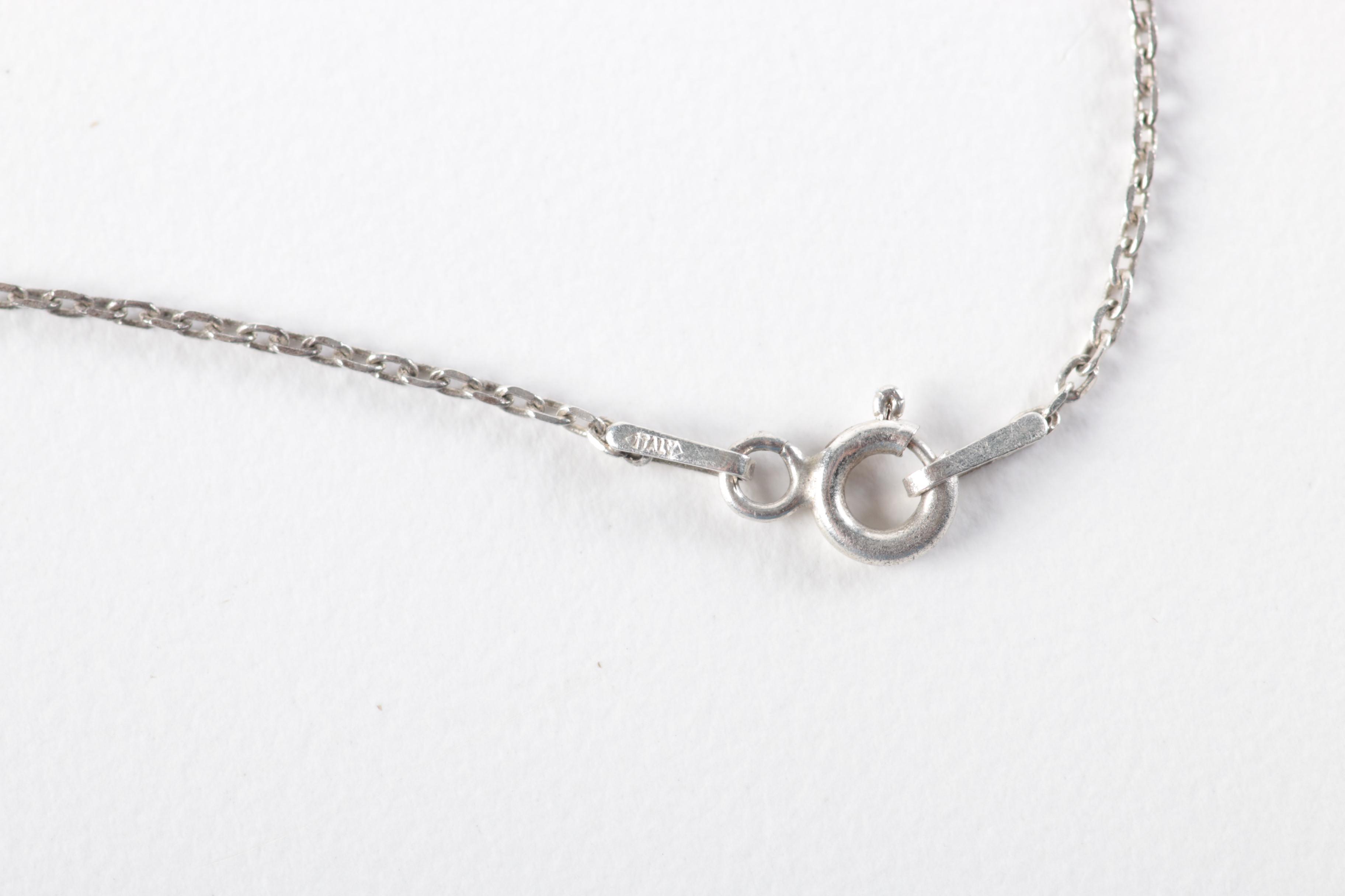 Sterling Silver Jewelry with Flowers Encased in Resin