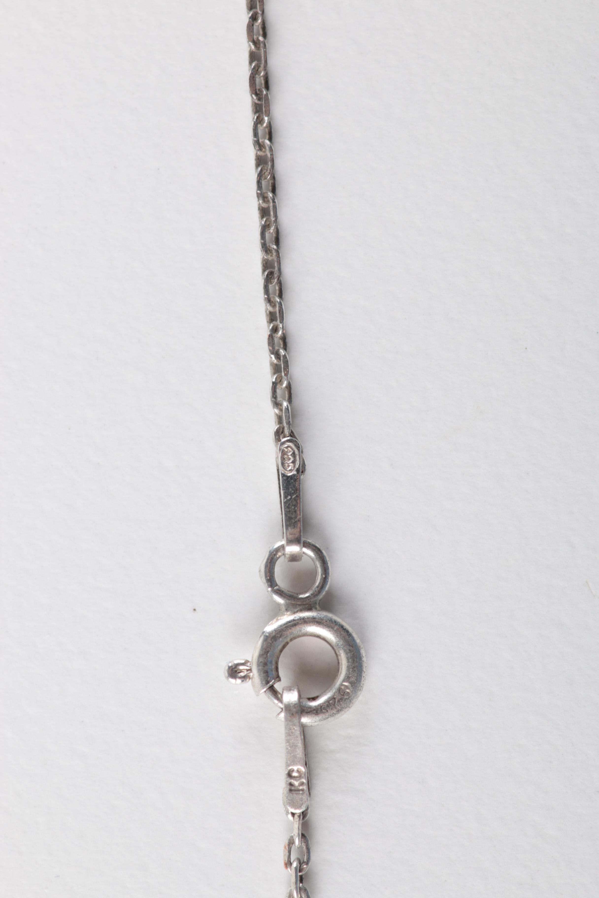 Sterling Silver Jewelry with Flowers Encased in Resin