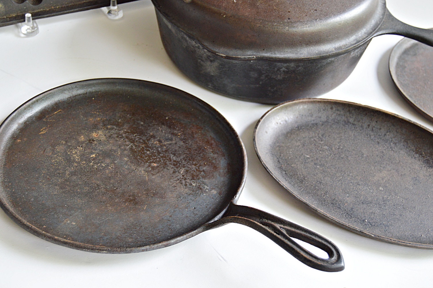 Seven Pieces of Vintage Cast Iron Cookware