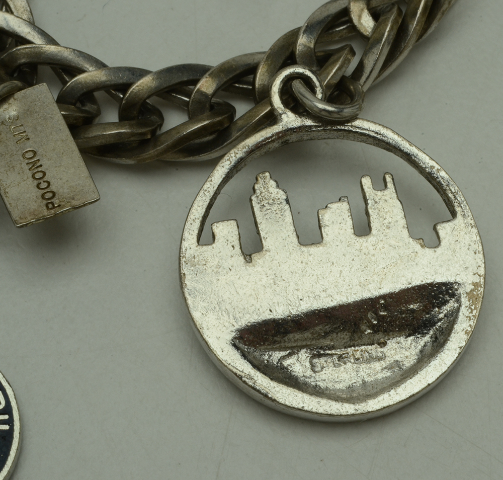 Three Sterling Charm Bracelets