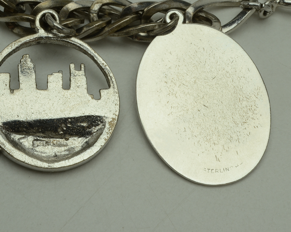 Three Sterling Charm Bracelets