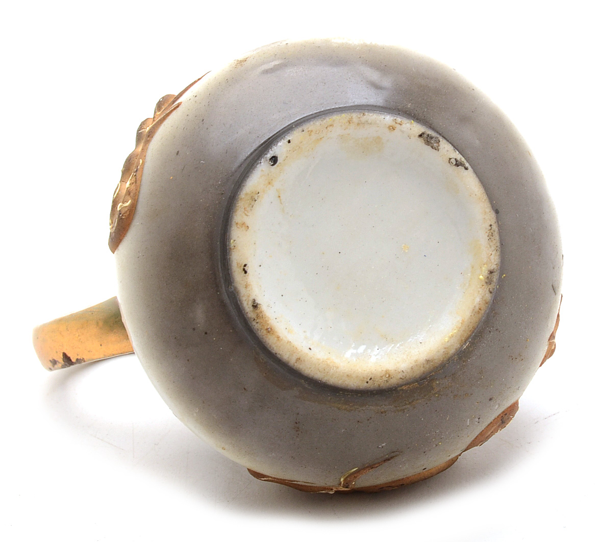 Two Miniature Japanese Porcelain Pitchers