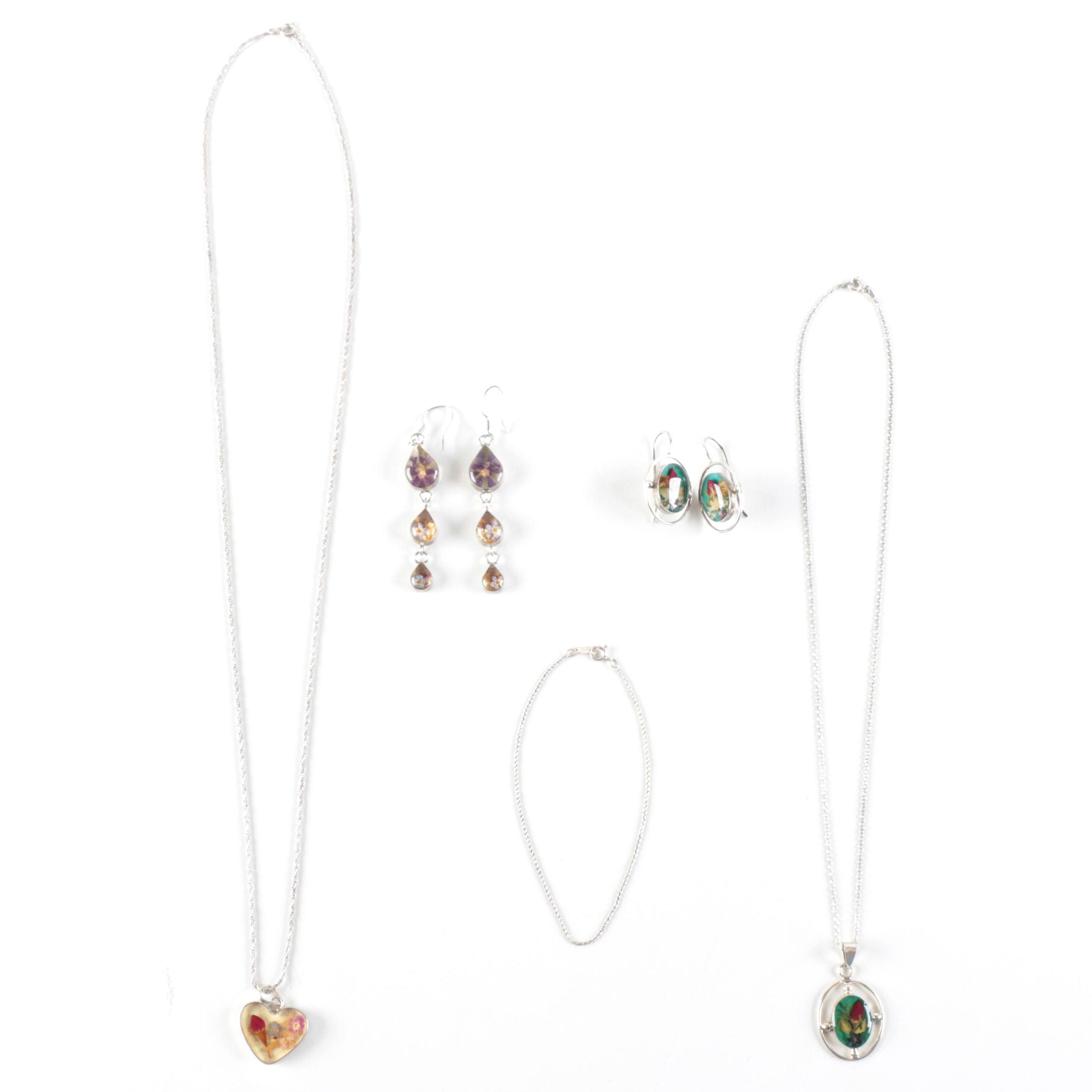 Sterling Silver Jewelry with Flowers Encased in Resin