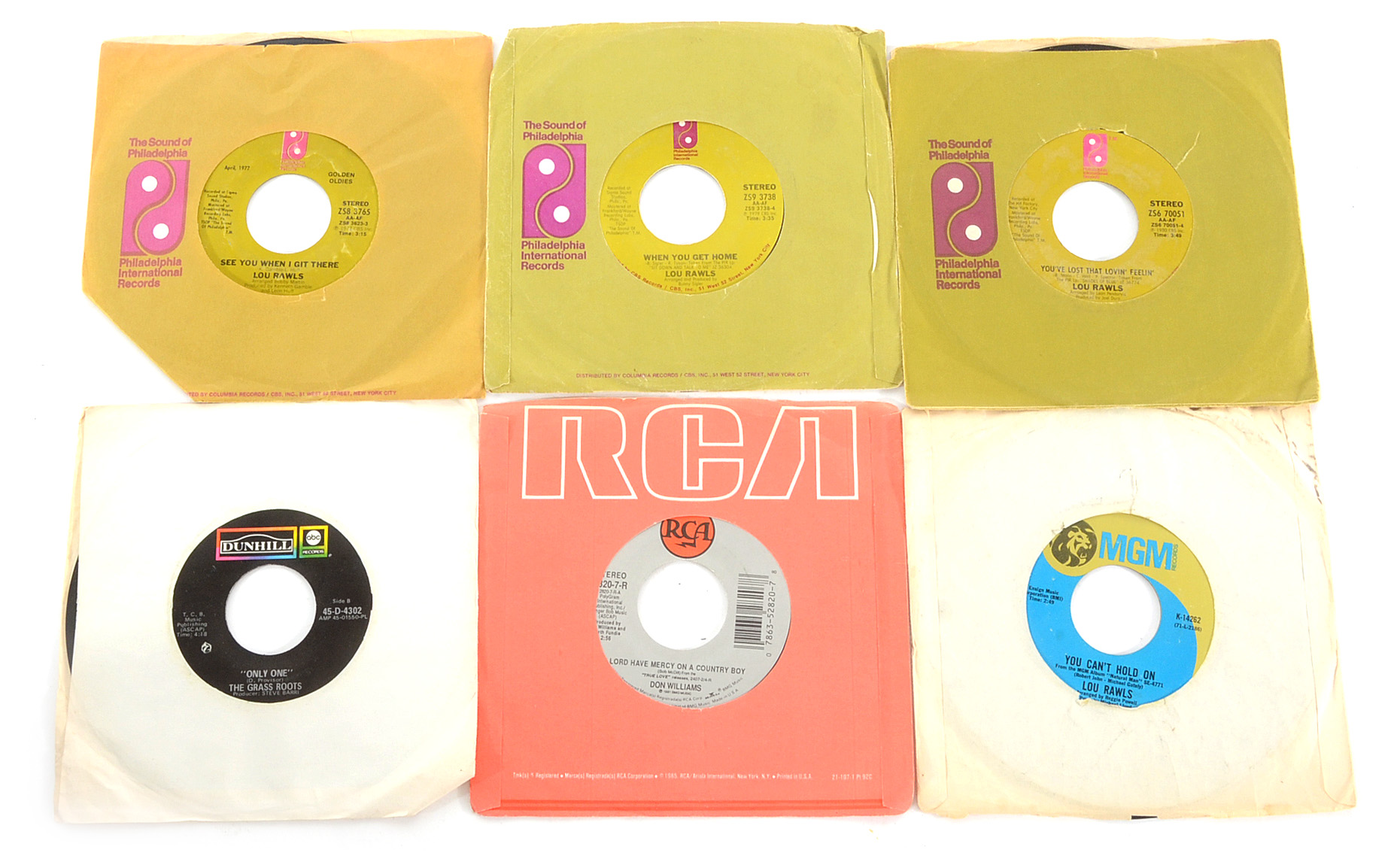 Over 100 Rock/Pop Singles and Vintage Portable Record Player