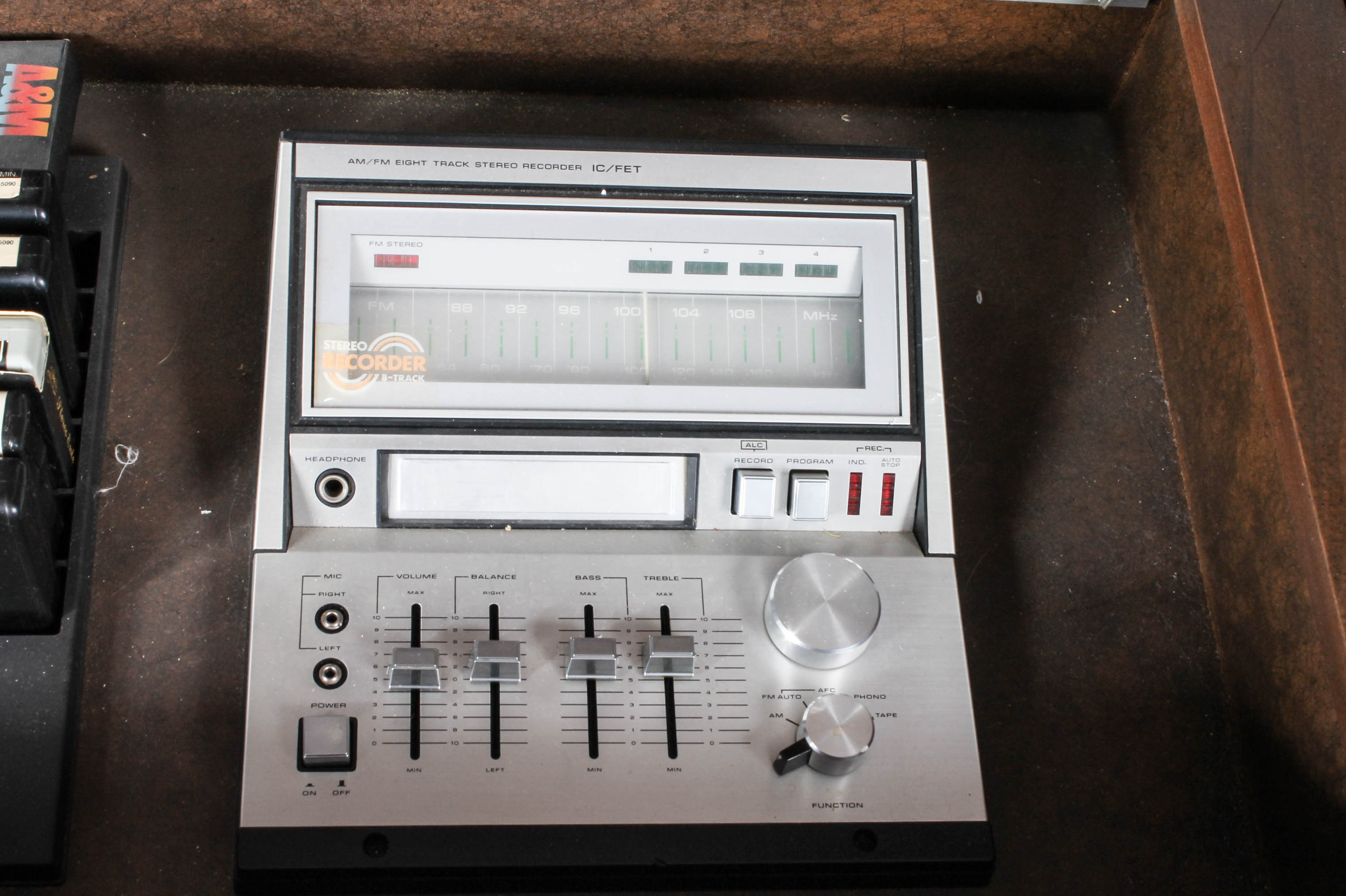 Vintage SoundDesign Stereo Console and 8-Track Tapes