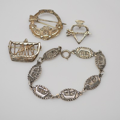 Three Themed Sterling Silver Brooches and One Bracelet