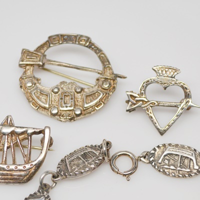 Three Themed Sterling Silver Brooches and One Bracelet