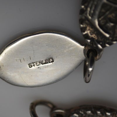 Three Themed Sterling Silver Brooches and One Bracelet