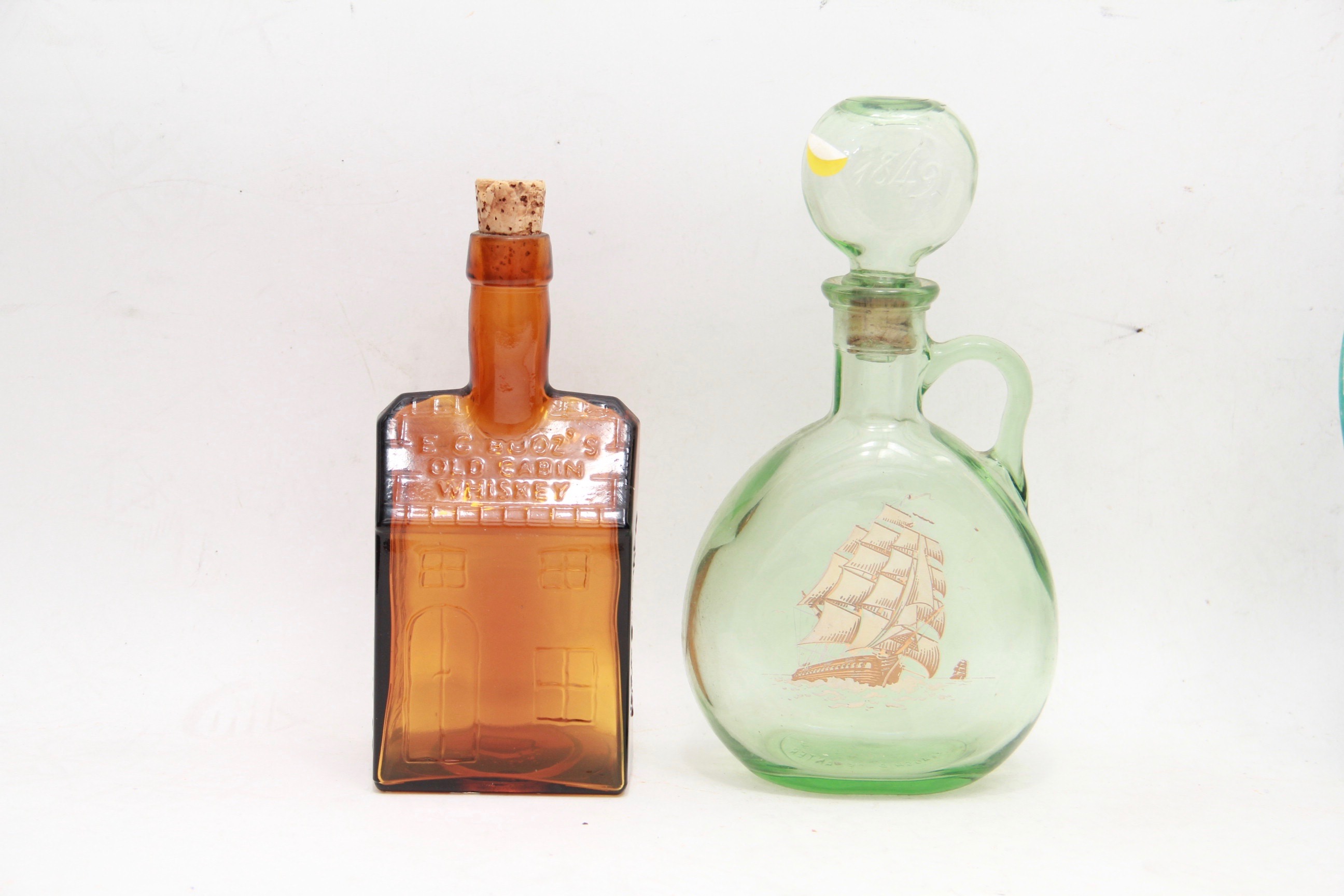 Vintage Glass Advertising Bottles Featuring Planters Peanuts