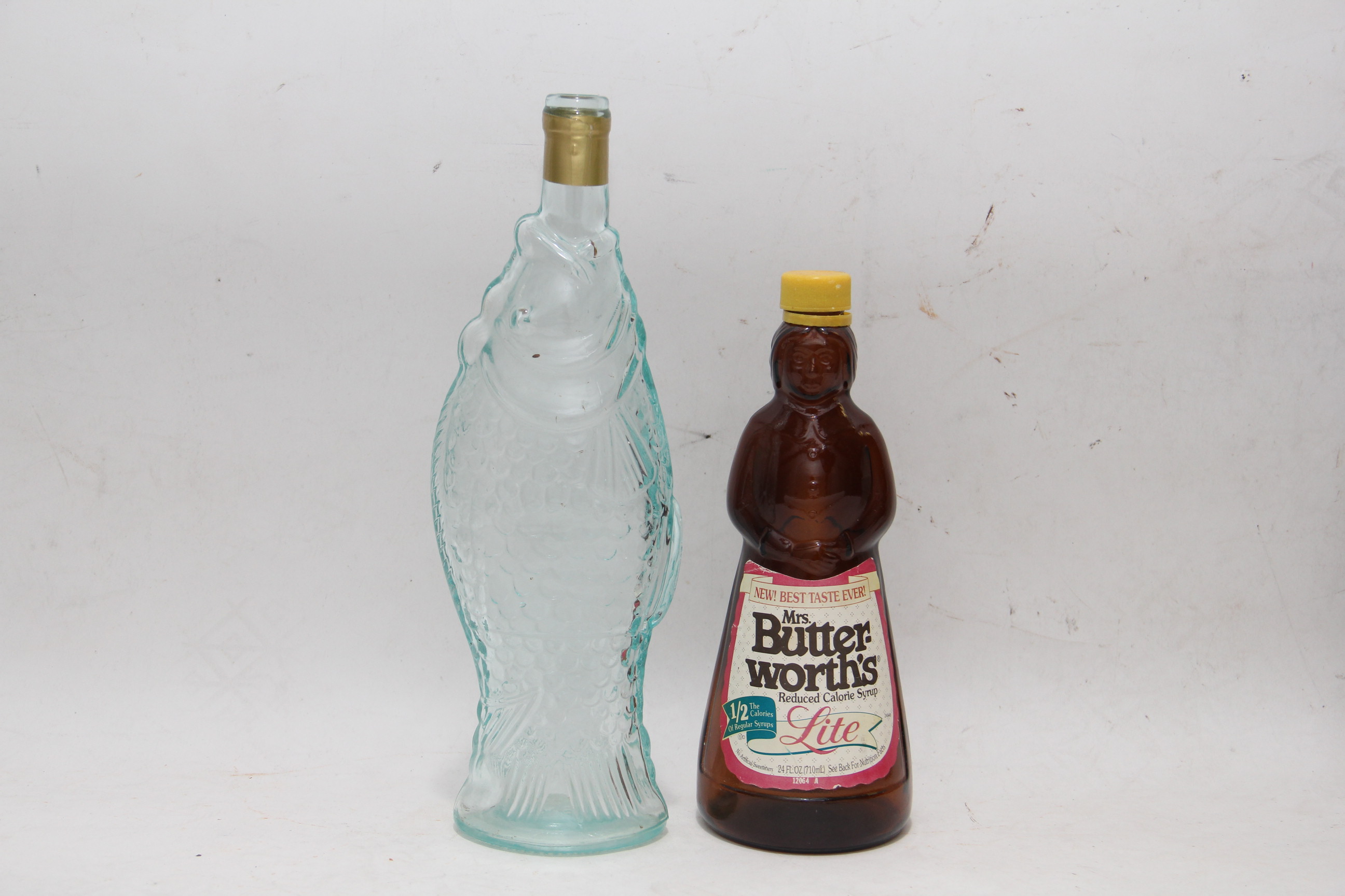 Vintage Glass Advertising Bottles Featuring Planters Peanuts