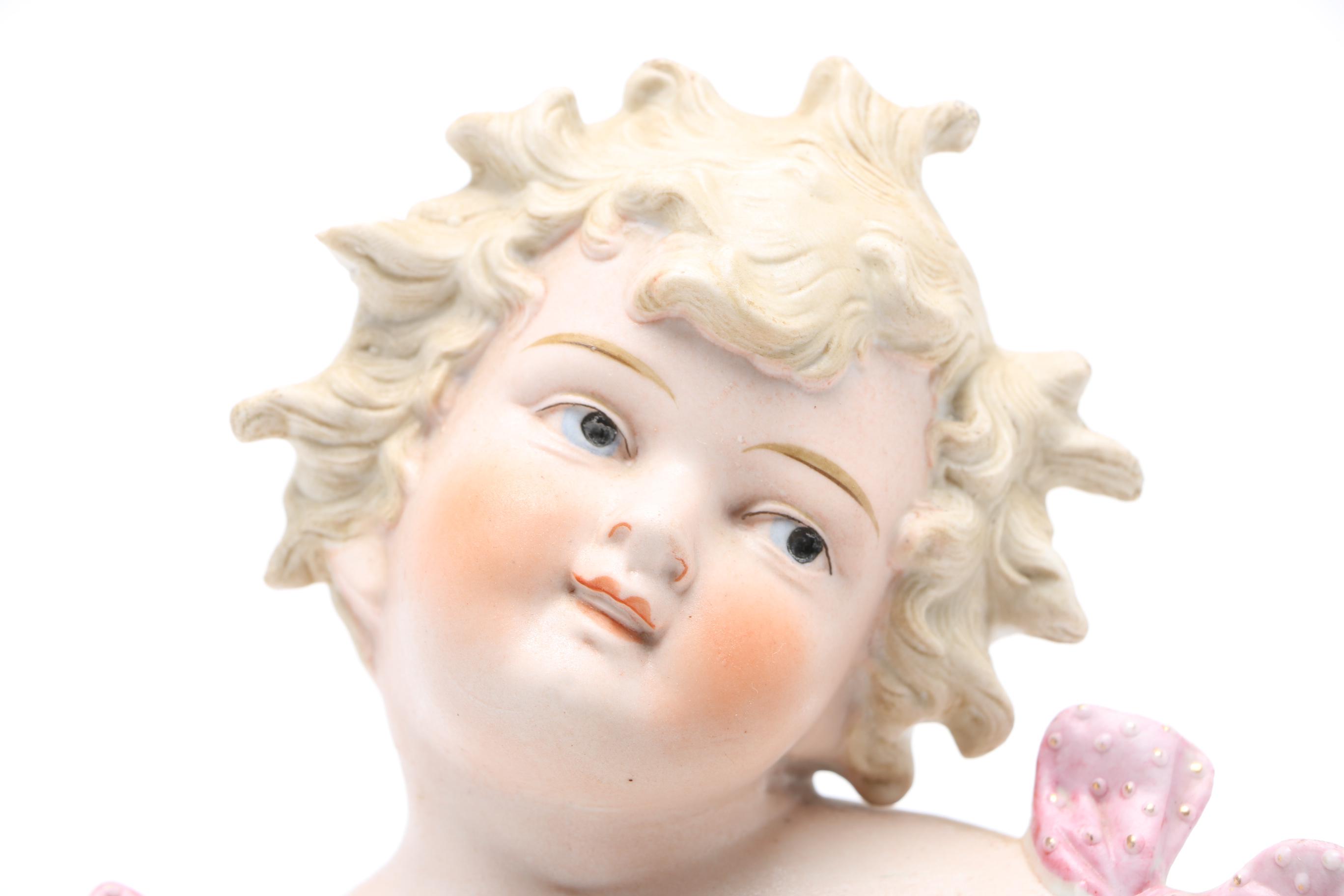 Piano Baby Bisque Figurine