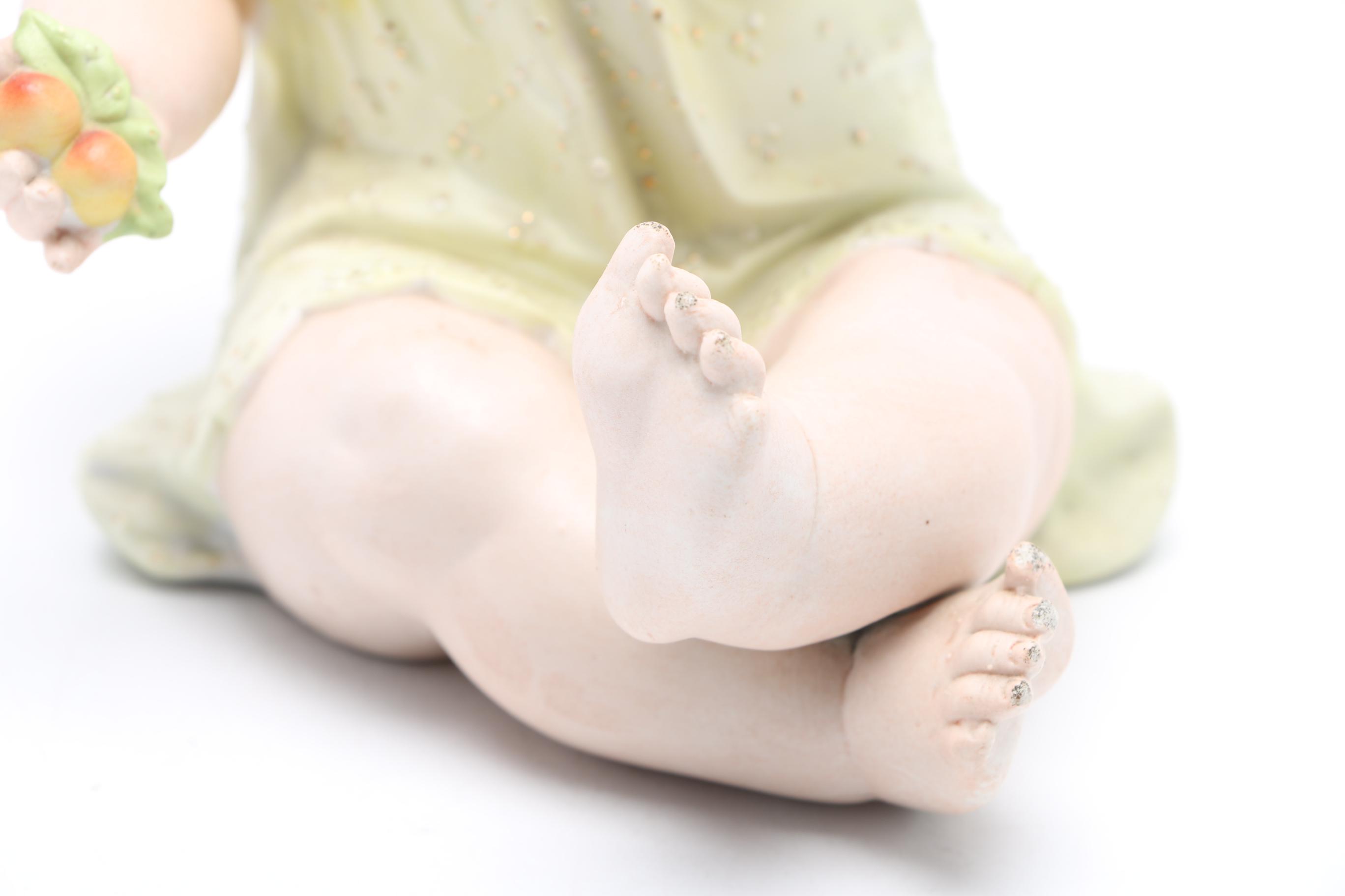 Piano Baby Bisque Figurine