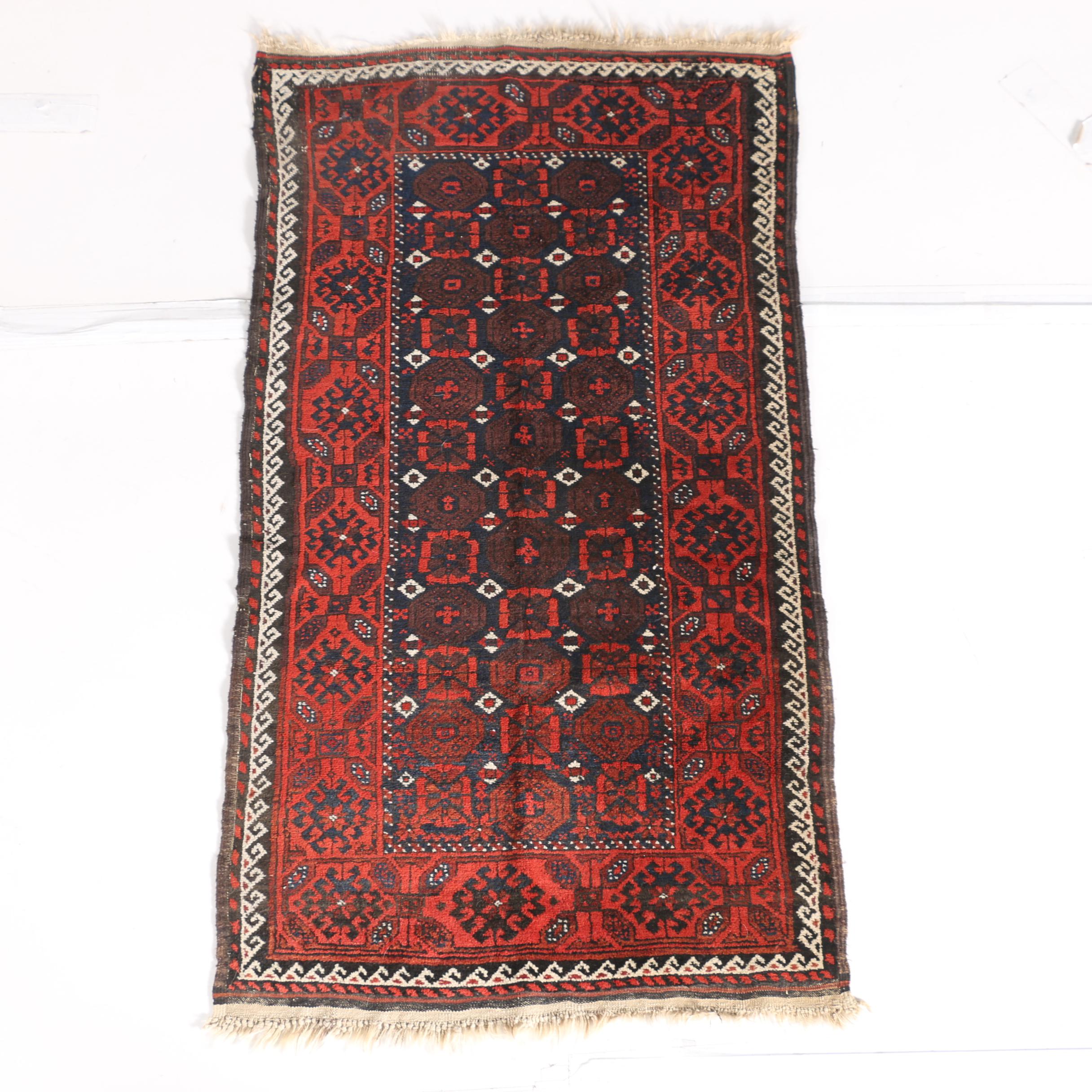 Antique Hand-Knotted Baluch Area Rug