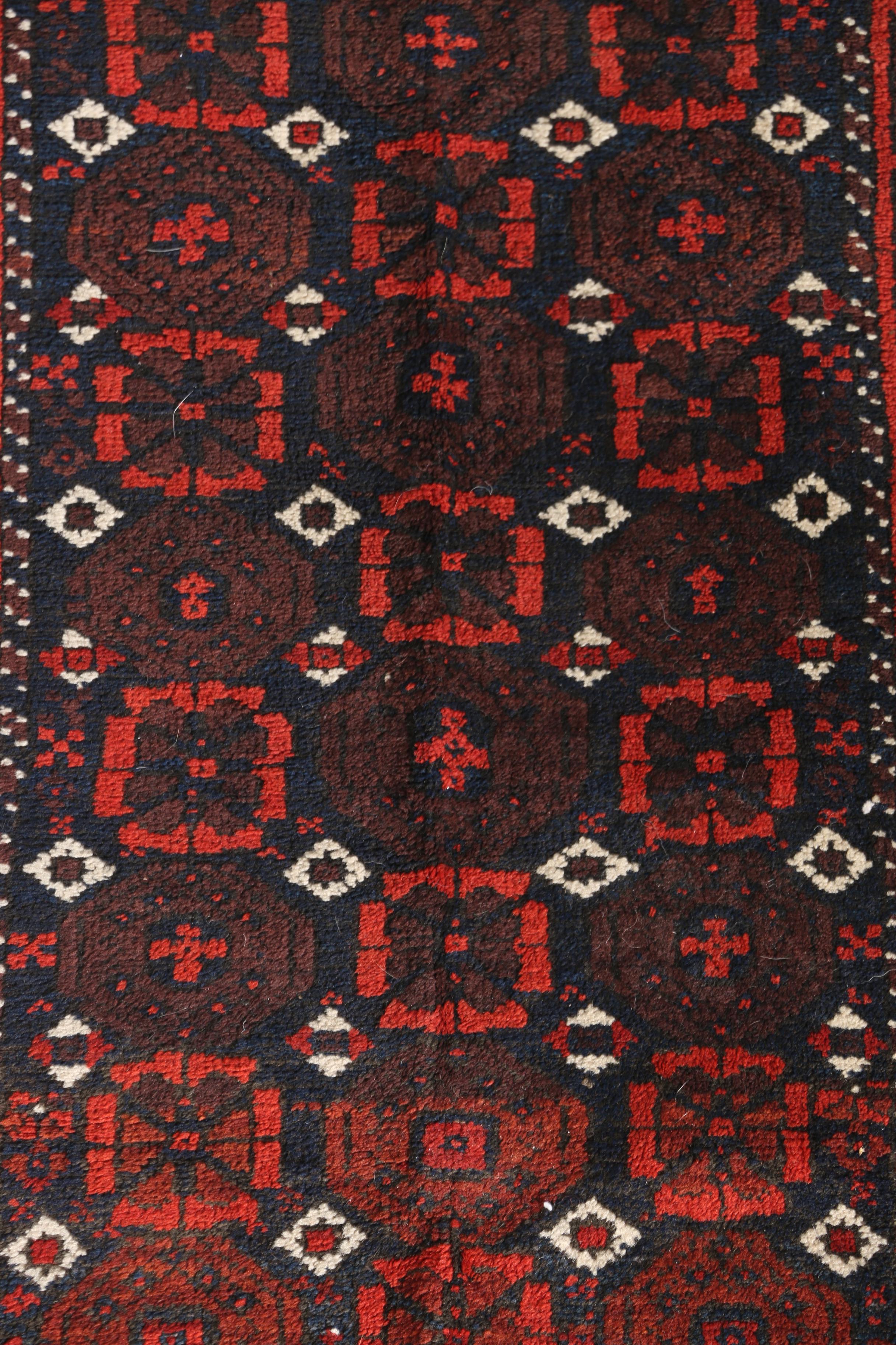 Antique Hand-Knotted Baluch Area Rug