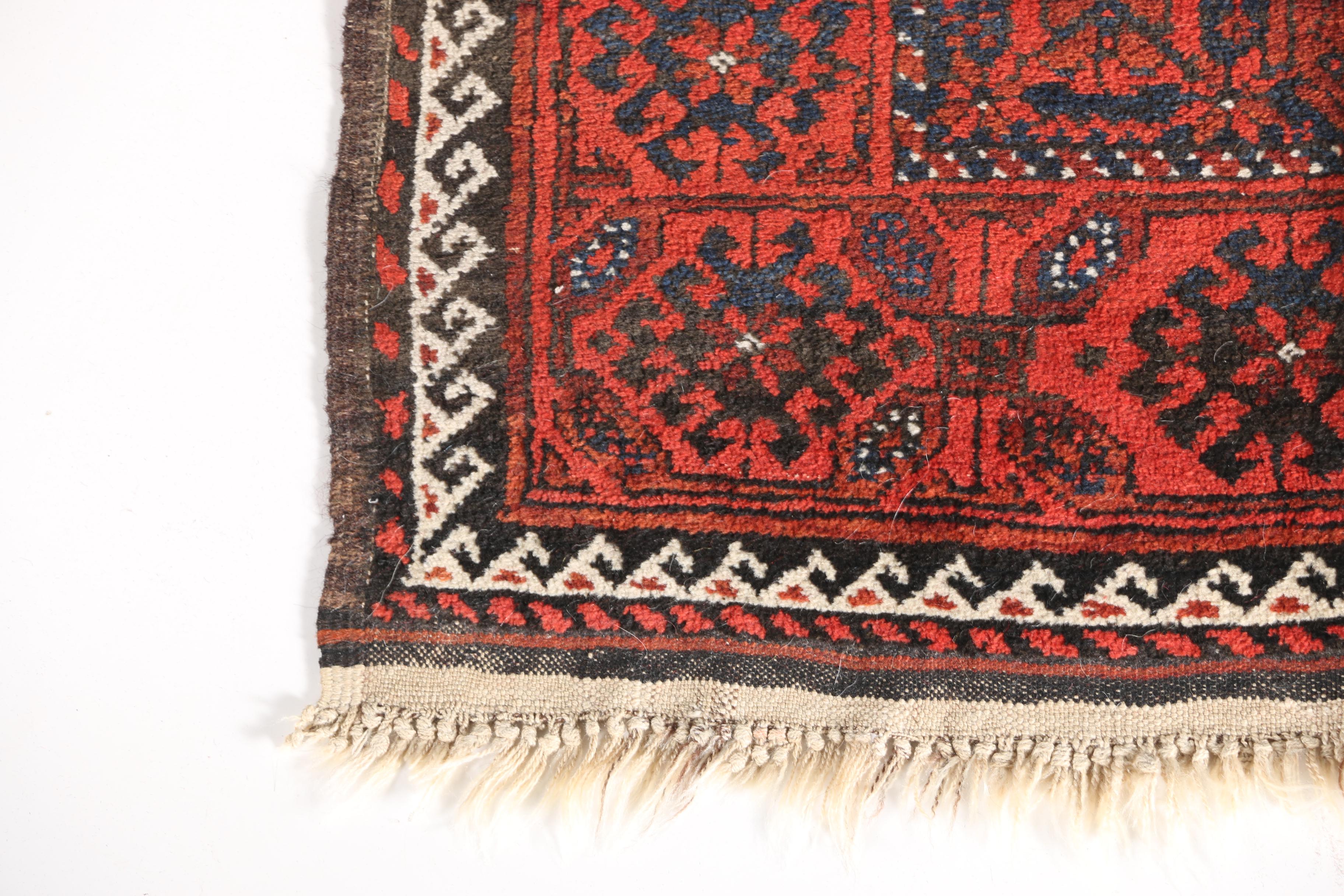 Antique Hand-Knotted Baluch Area Rug
