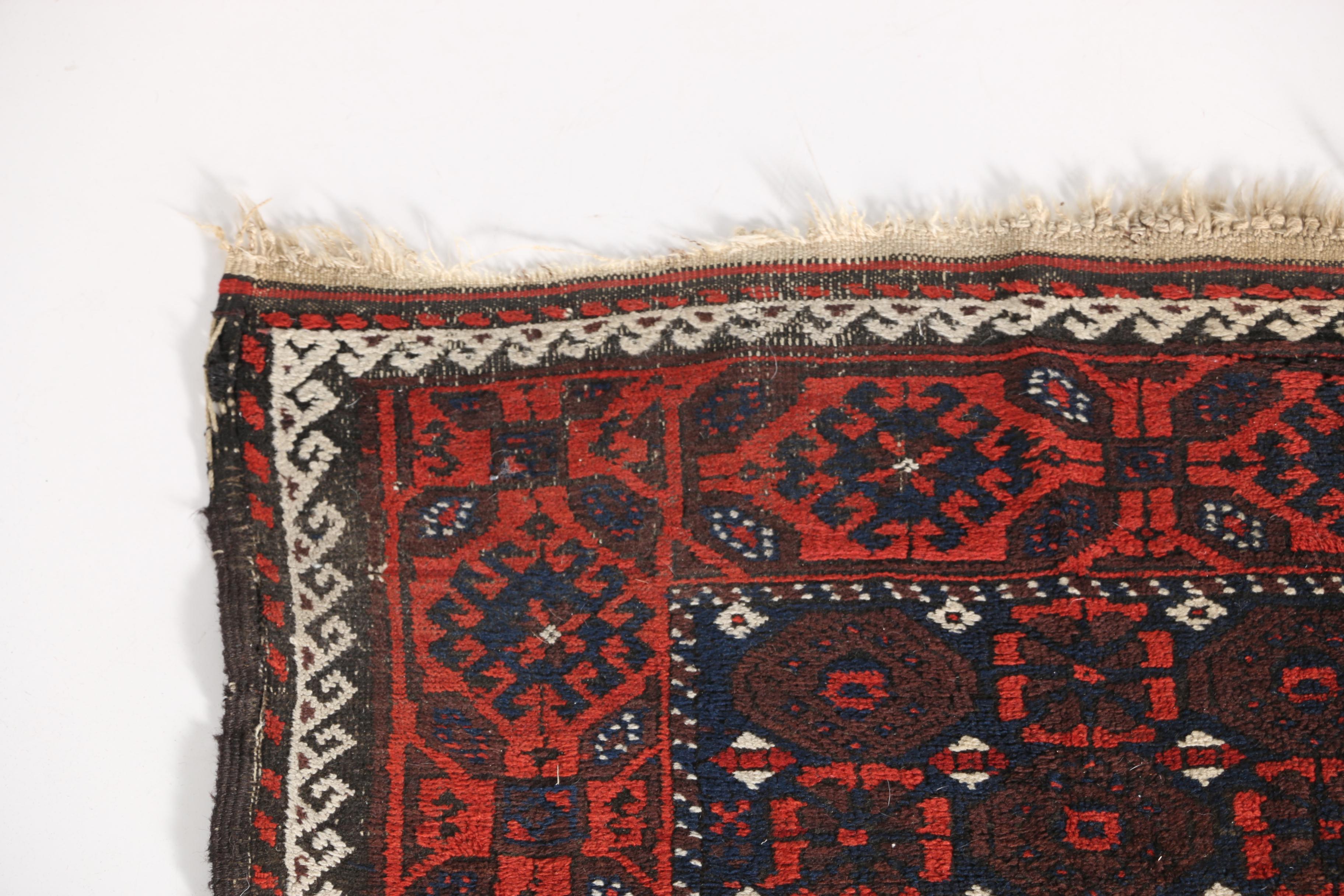 Antique Hand-Knotted Baluch Area Rug