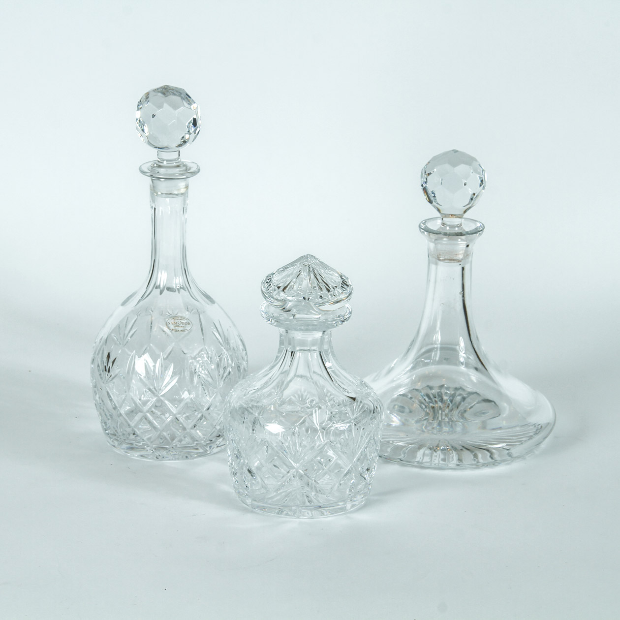 Three Crystal and Glass Decanters