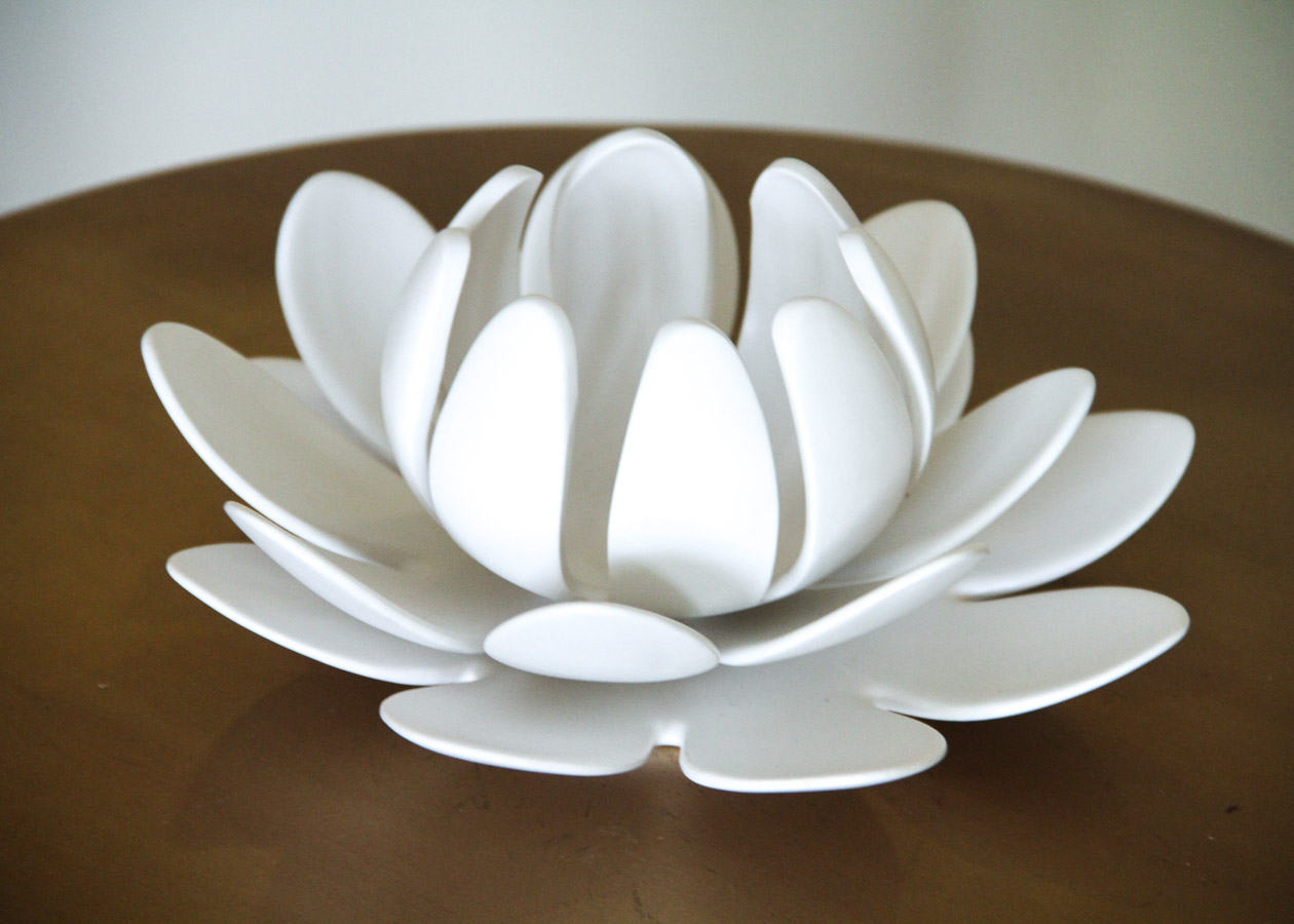 Wicker Chair with Side Table, Throw, and Votive