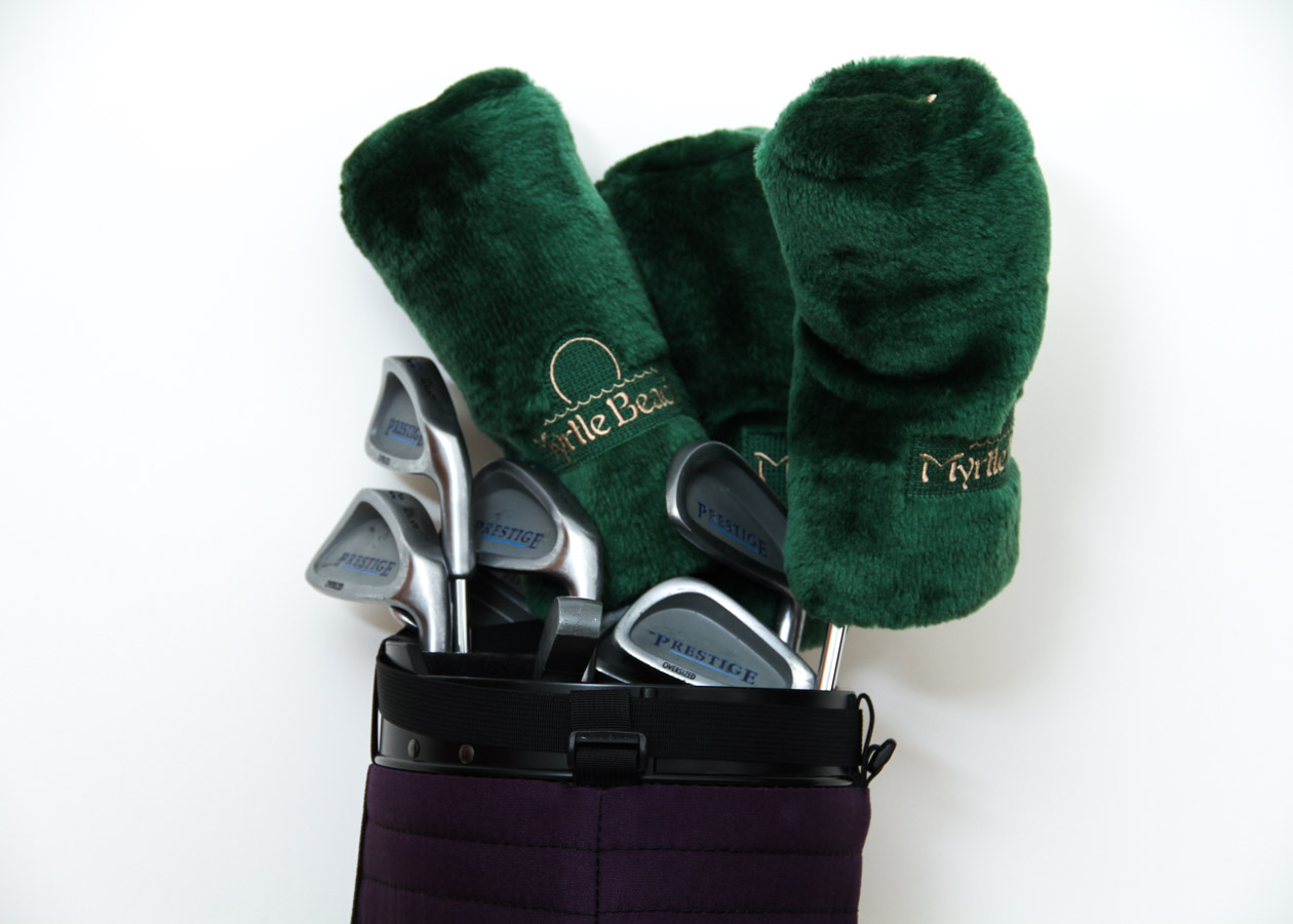 Collection of Wilson Golf Clubs and Accessories