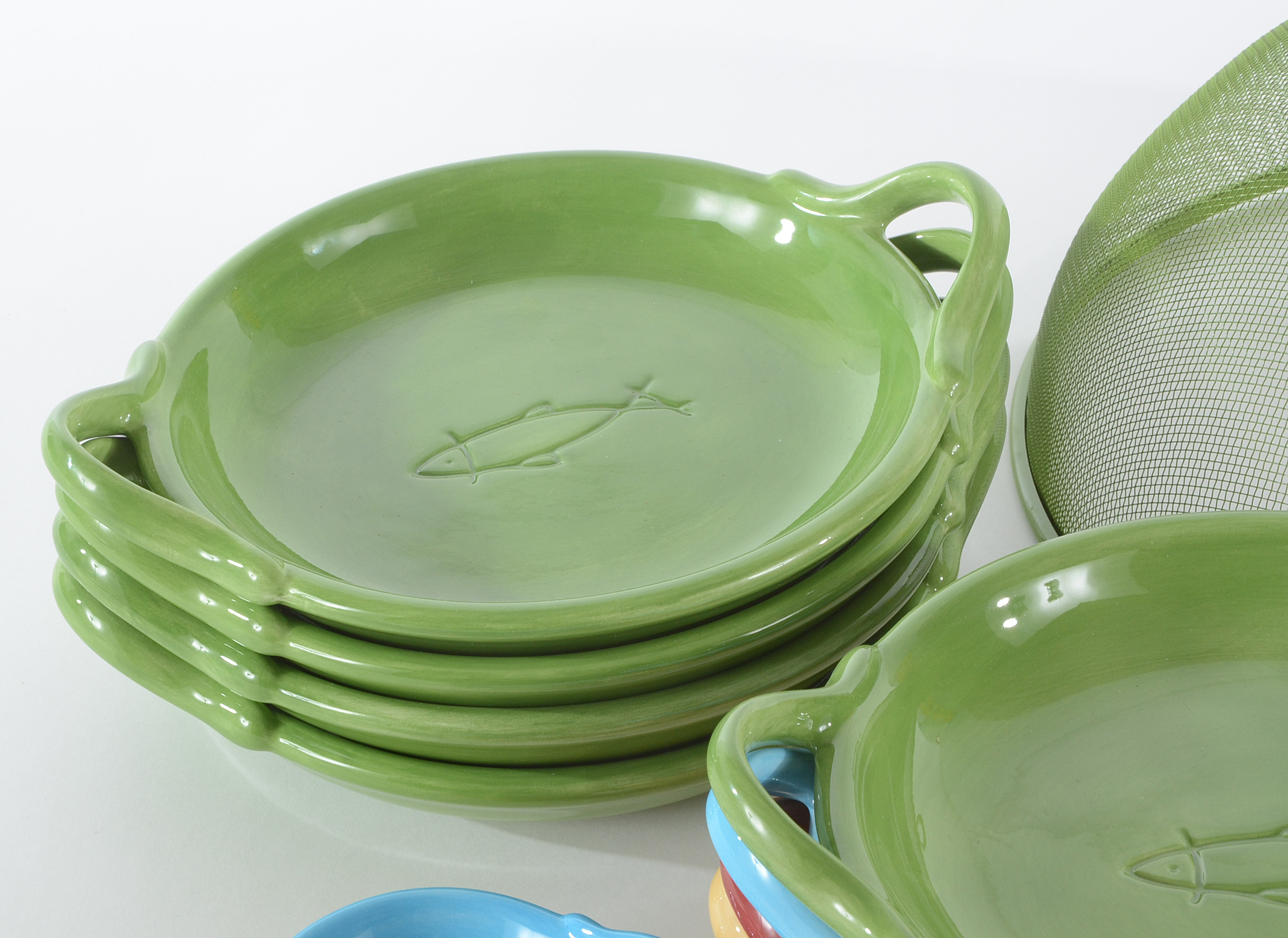 Collection of Pottery Barn Fiesta Ware Dishes and Placemats