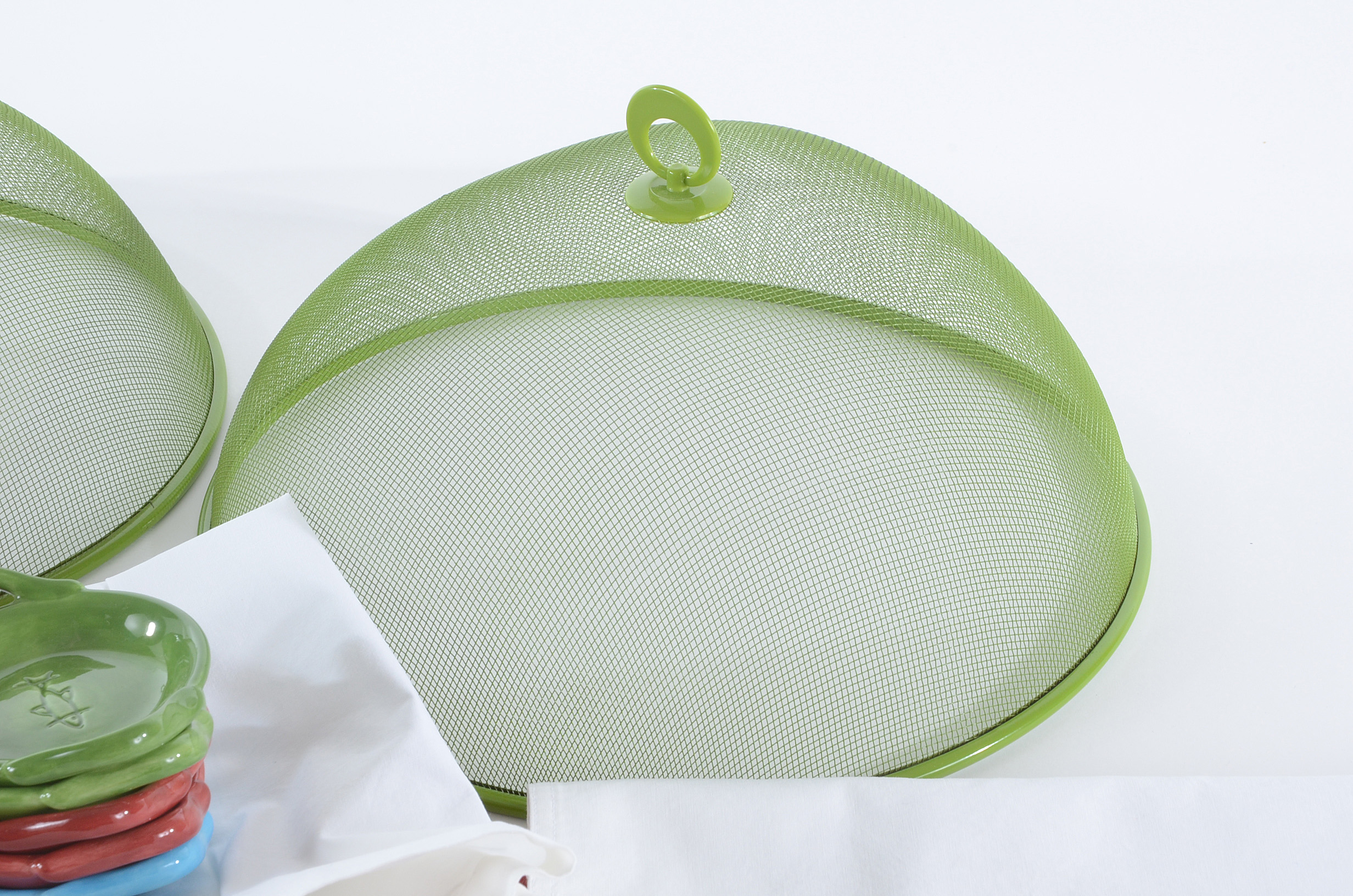 Collection of Pottery Barn Fiesta Ware Dishes and Placemats