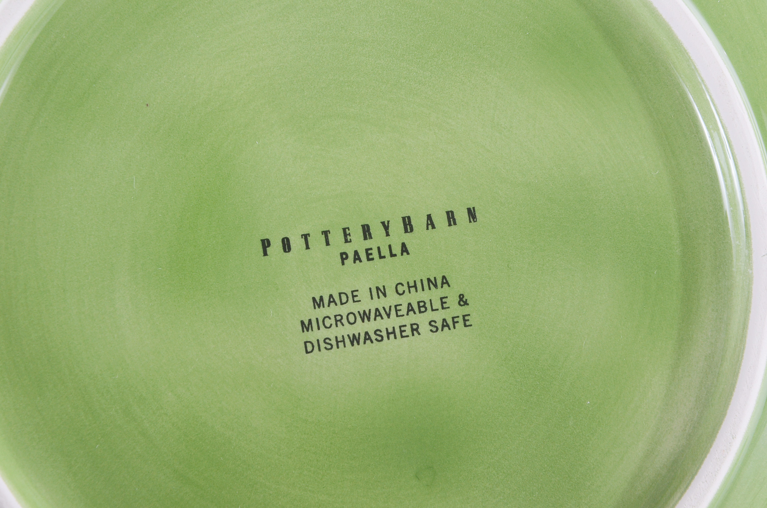 Collection of Pottery Barn Fiesta Ware Dishes and Placemats