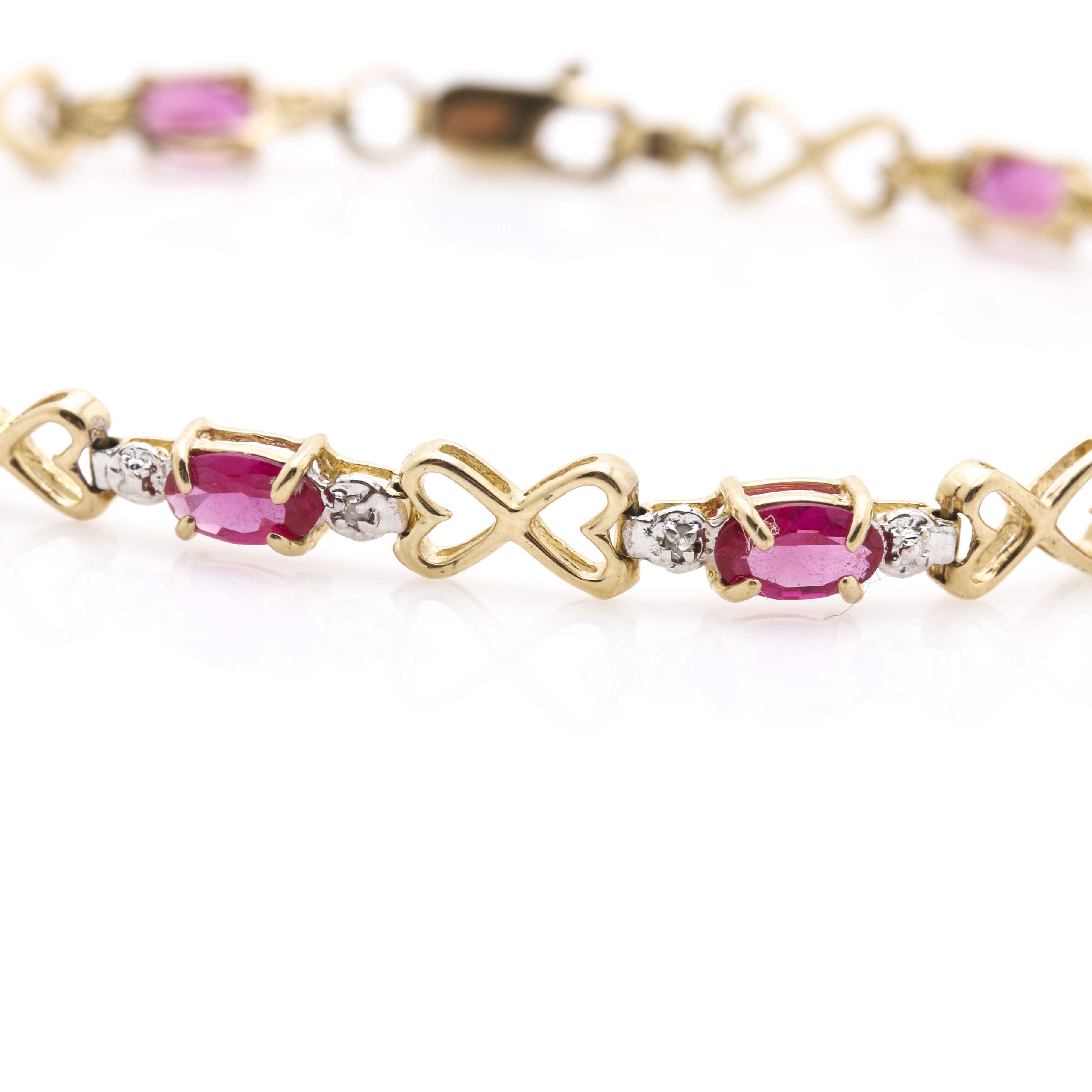 10K Yellow Gold Diamond and Synthetic Ruby Heart Bracelet