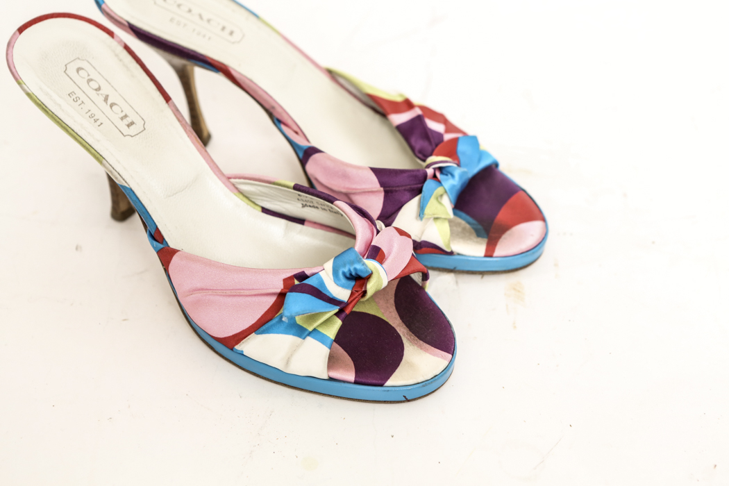 Prada, Ferragamo, Manolo Blahnik, Jimmy Choo and Coach Shoes