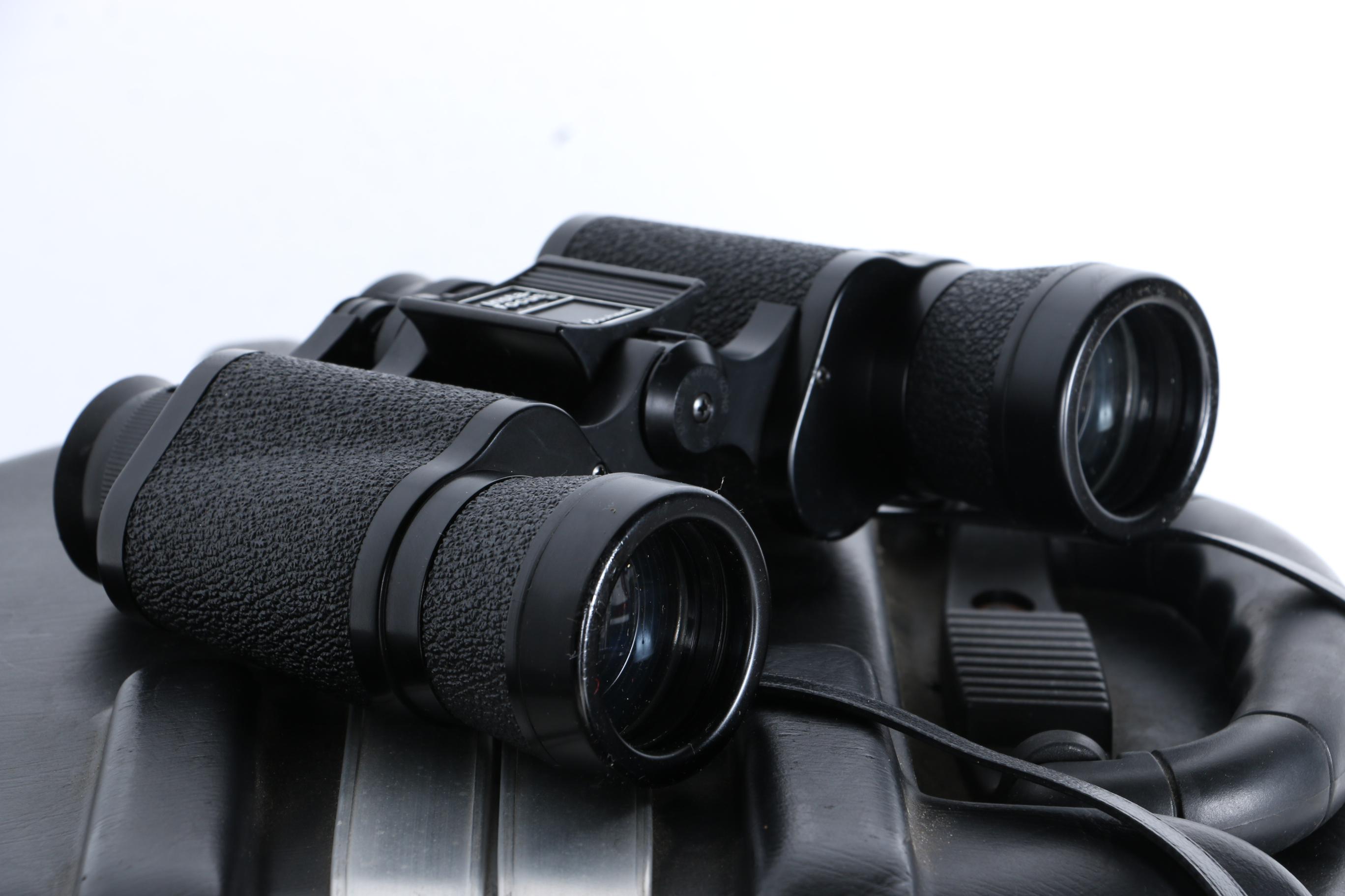 Golf Clubs and Case With Bushnell Binoculars