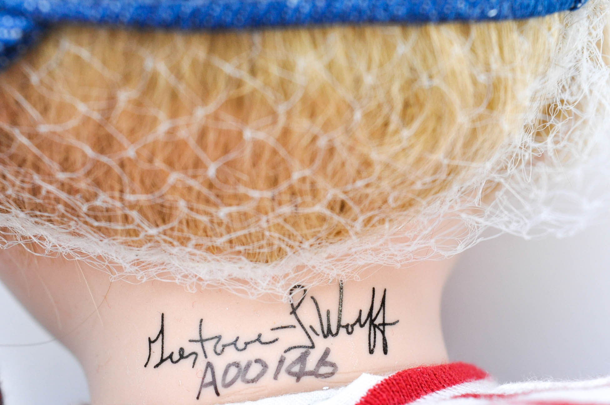 Seven Gustave Wolff Sculpted Dolls