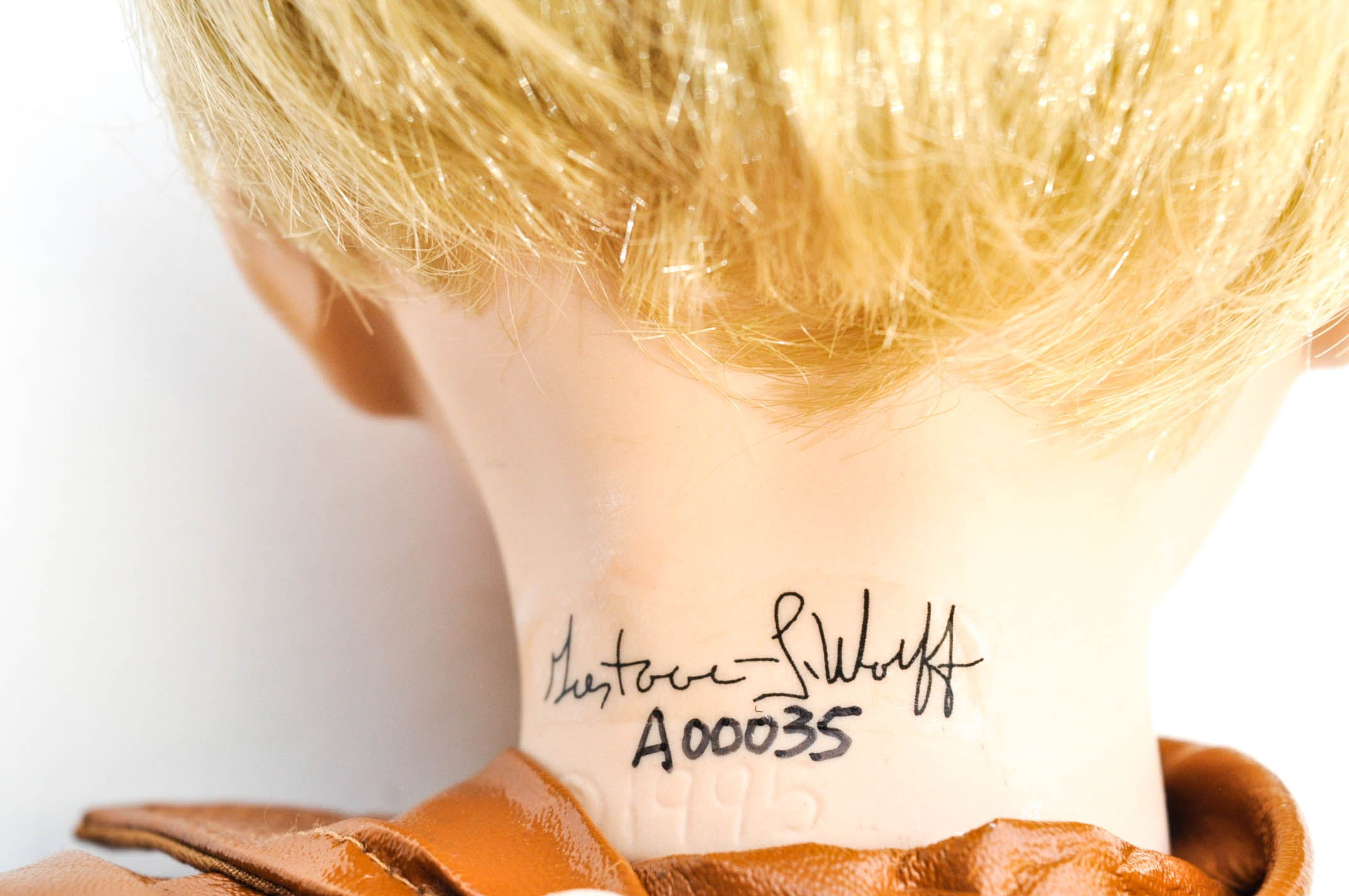 Seven Gustave Wolff Sculpted Dolls